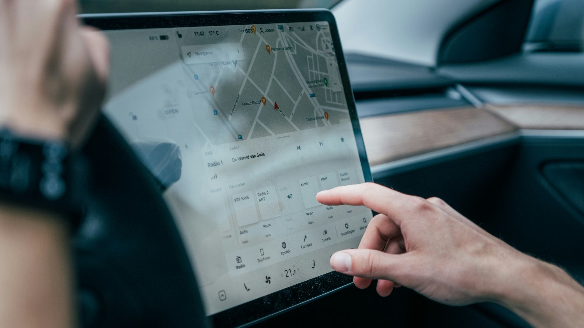 a person using a laptop in a car