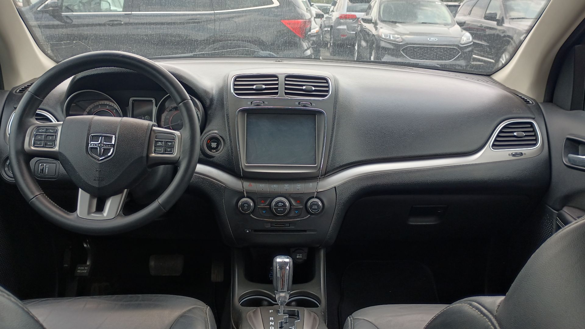 Dashboard of a 2020 Dodge Journey Crossroad midsize crossover.