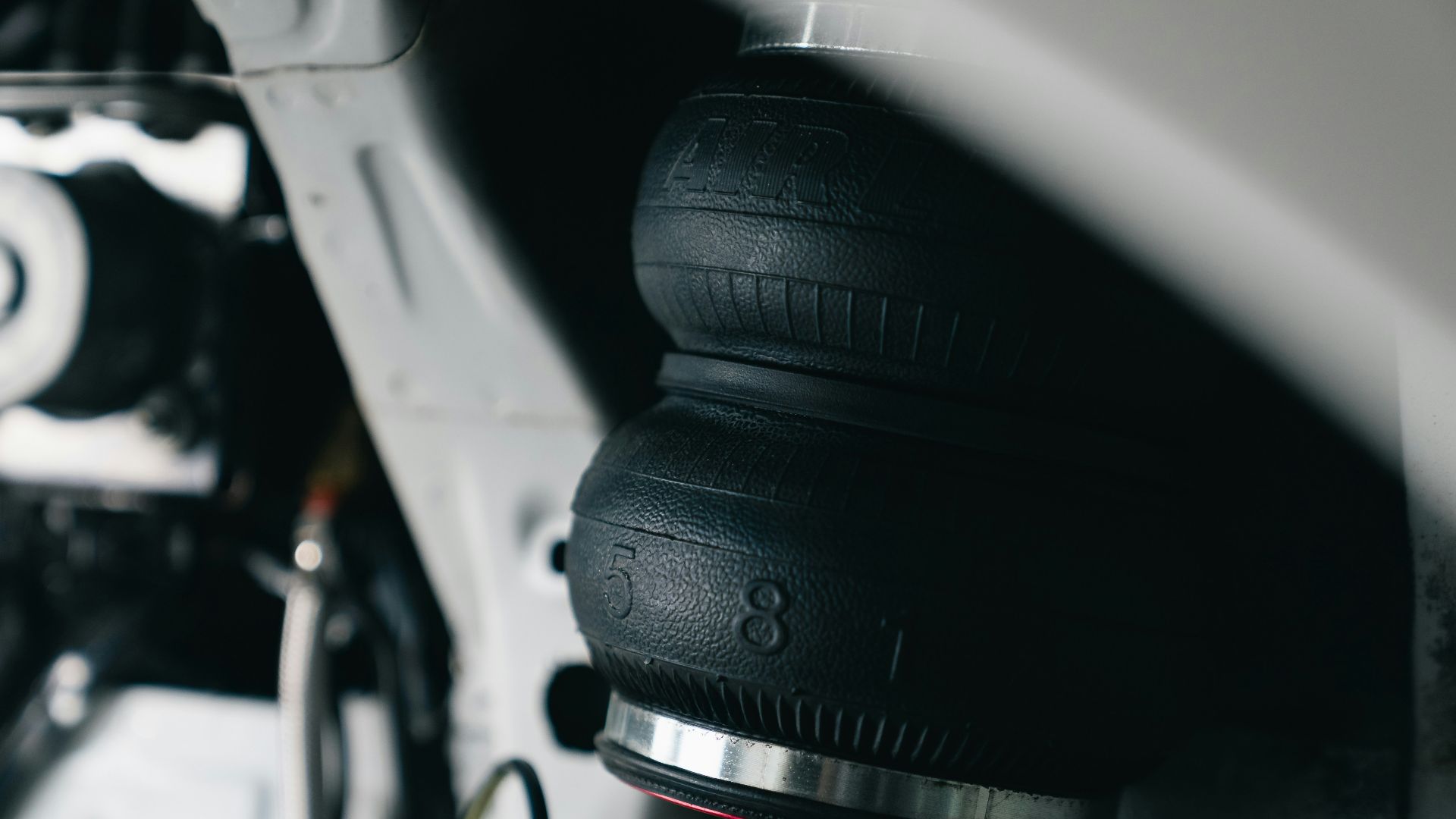 Black air suspension bag with metal ring