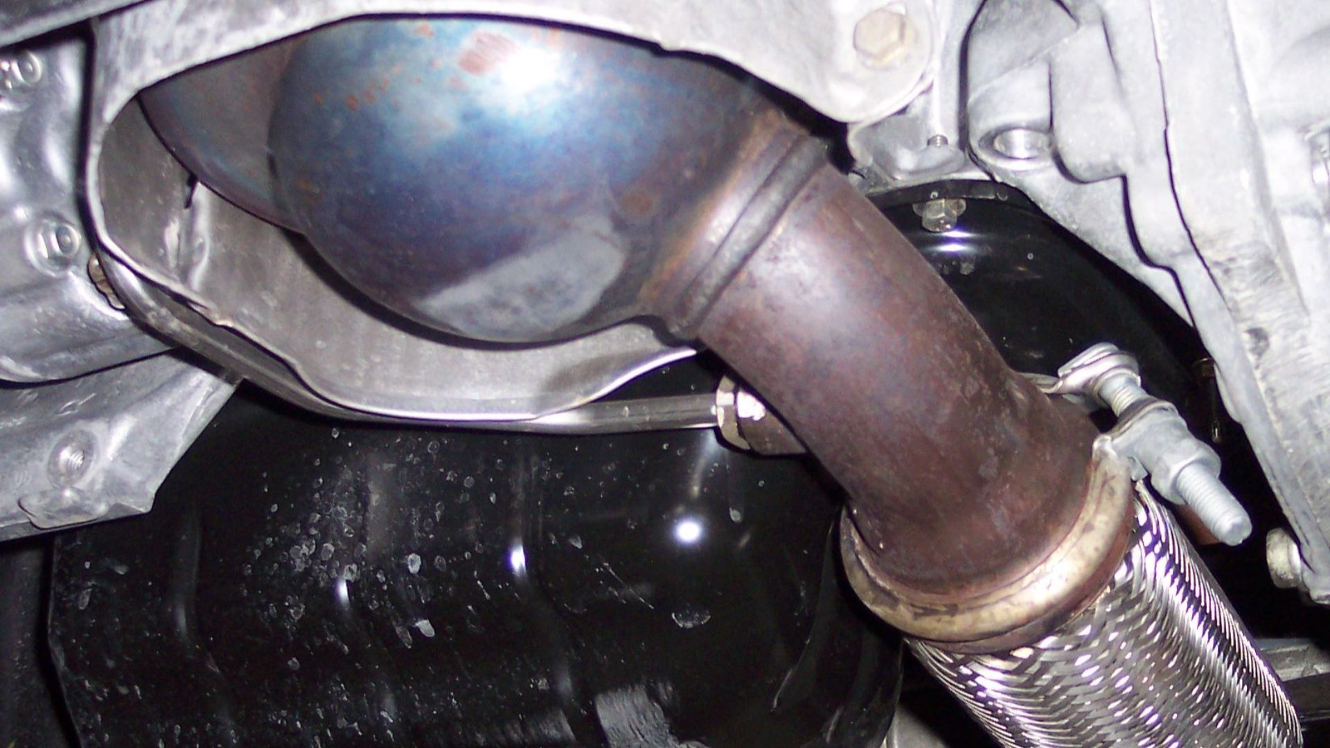 Diesel Particulate Filter (DPF) built in the exhaust pipe of a Peugeot)