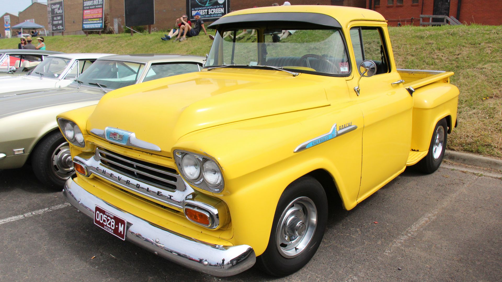 The Chevrolet Motor Company was formed in 1911.
From 1955-59 the Chevy Pickups were known as the Task Force Series.
1955; Wrap-around windshield, single headlights and one-piece emblem is mounted below horizontal line on fender.
1956; wider hood emblem