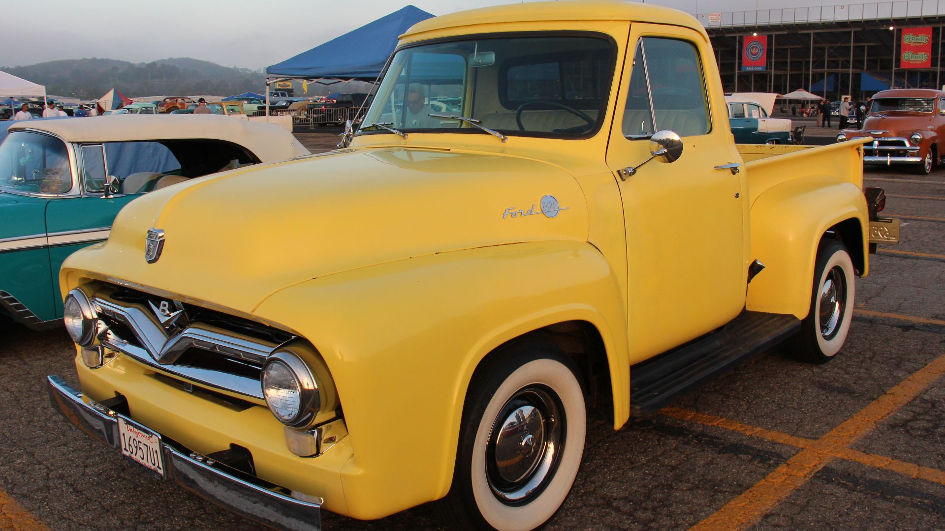 Ford had been producing factory made pickup trucks since 1925.
In 1953, the F-1 Pickup became the F-100. With these 1953-56 second generation F Series pickups, the cab was extended, they got a stylish new grille, and longer hood that flowed into the fron