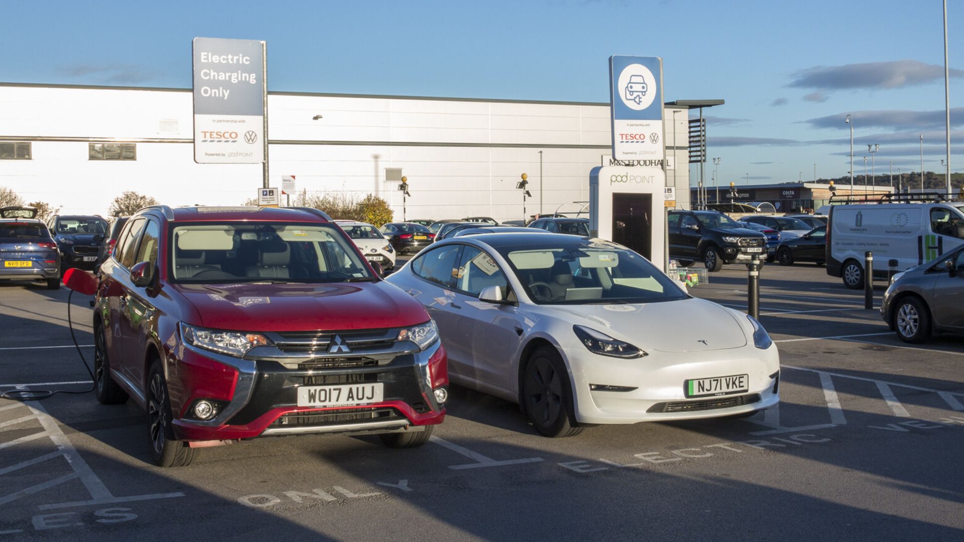 Car park with electric vehicle charging point
