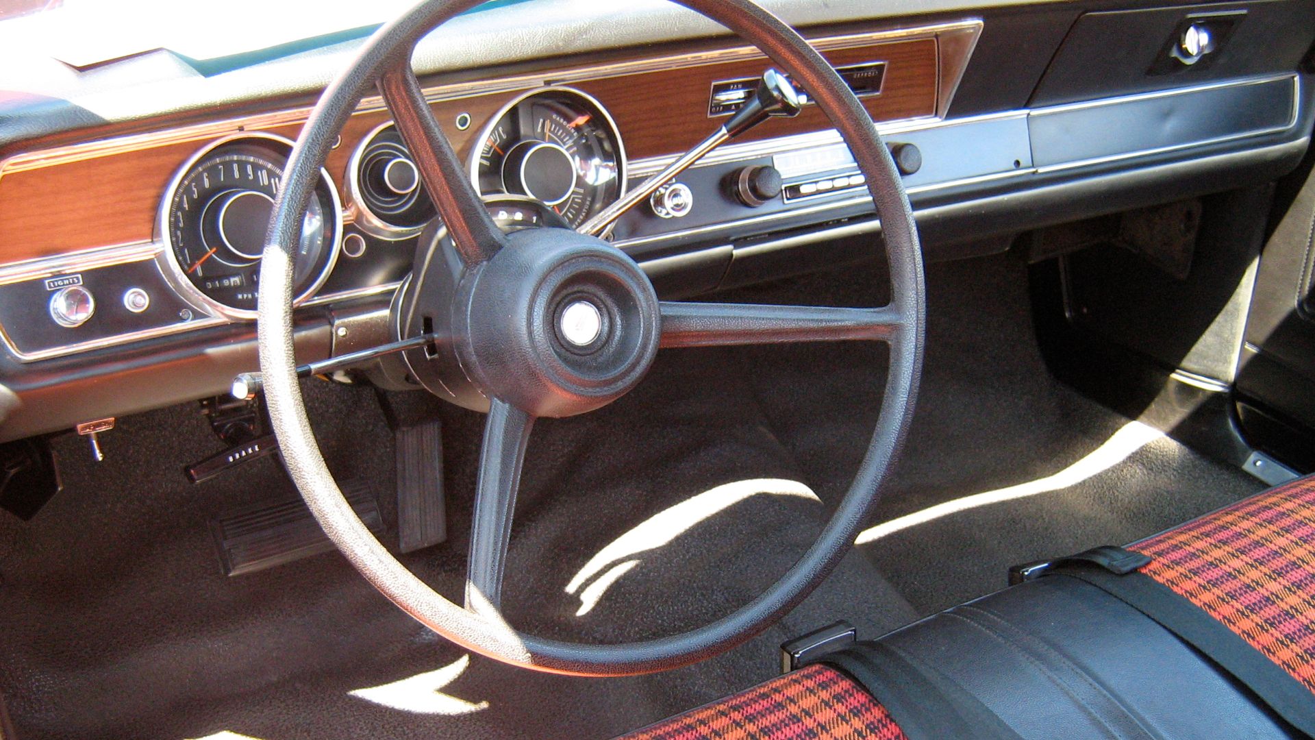1971 Plymouth Duster two-door sedan. Dashboard inside this base model with optional (extra cost) upholstery.