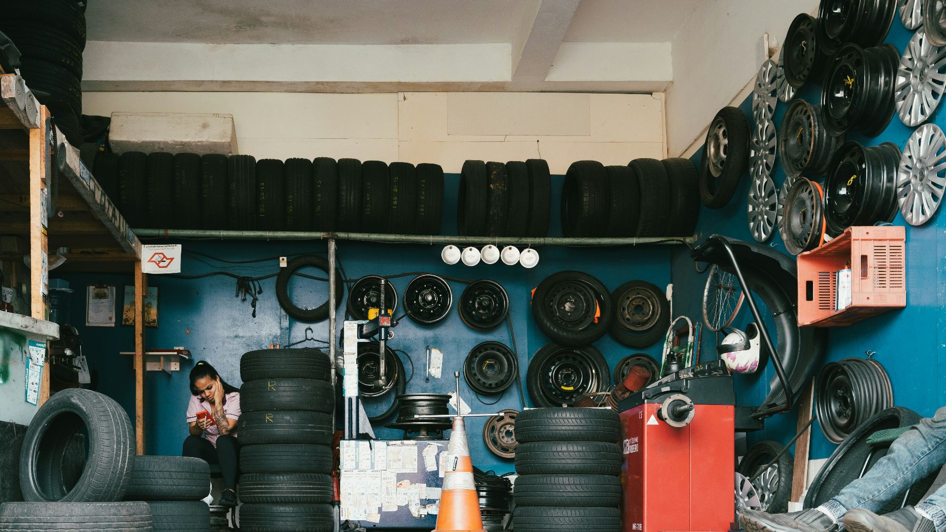 a garage filled with lots of tires and tires
