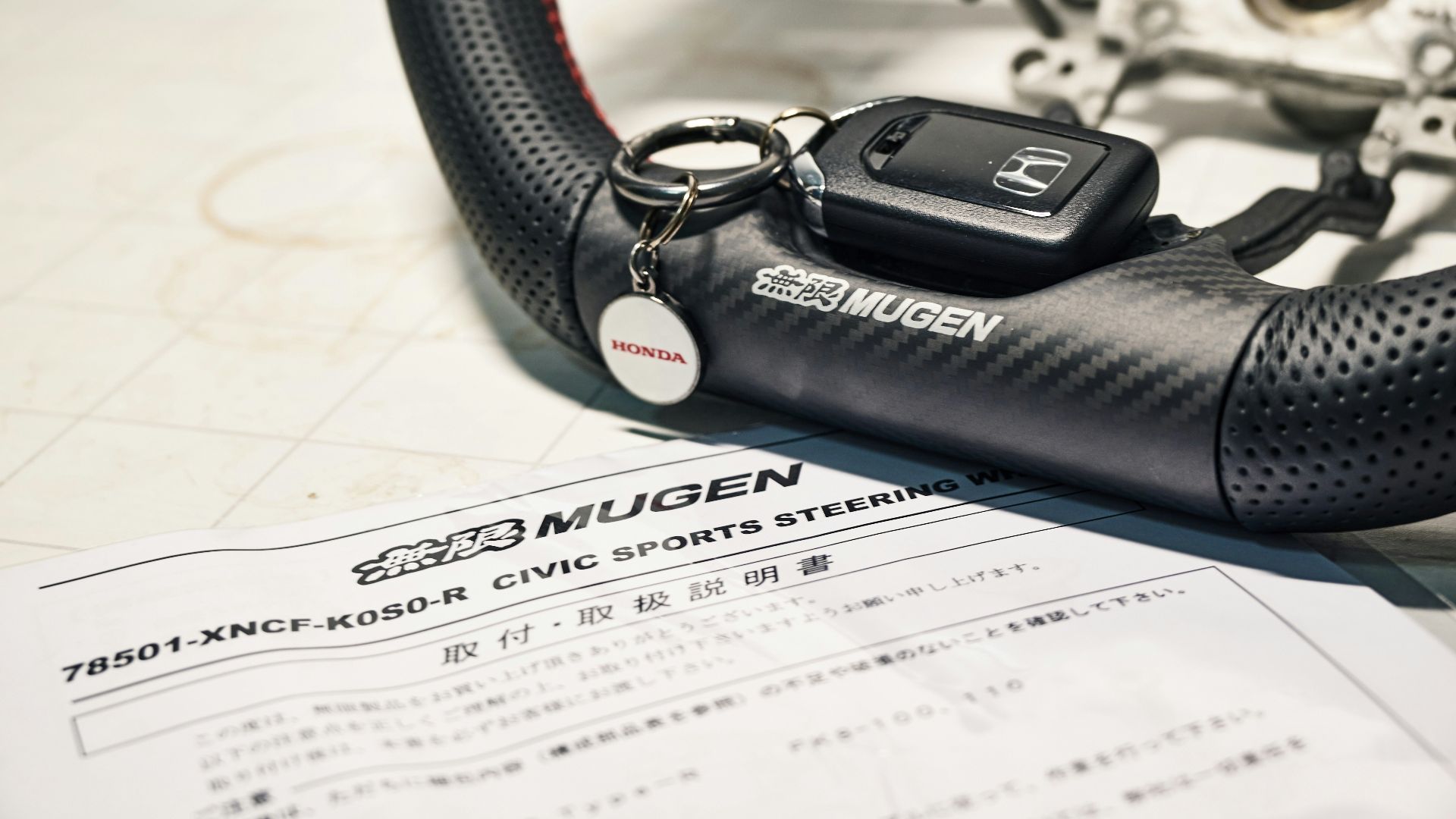black and silver mercedes benz car fob