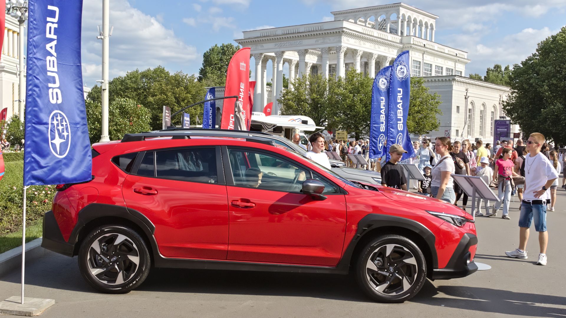Gray-import Subarus at a car show in Moscow
