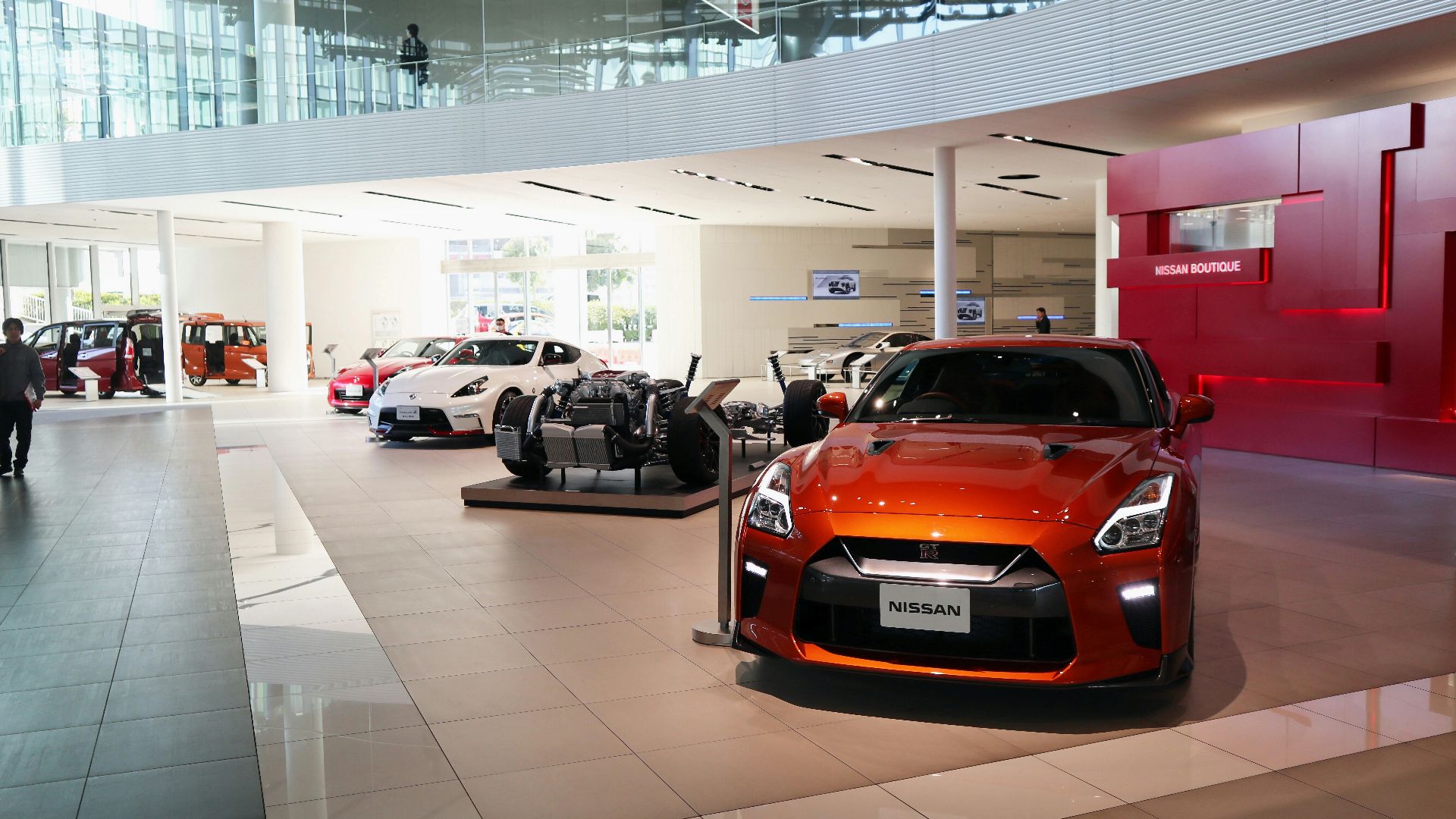a car showroom filled with lots of cars
