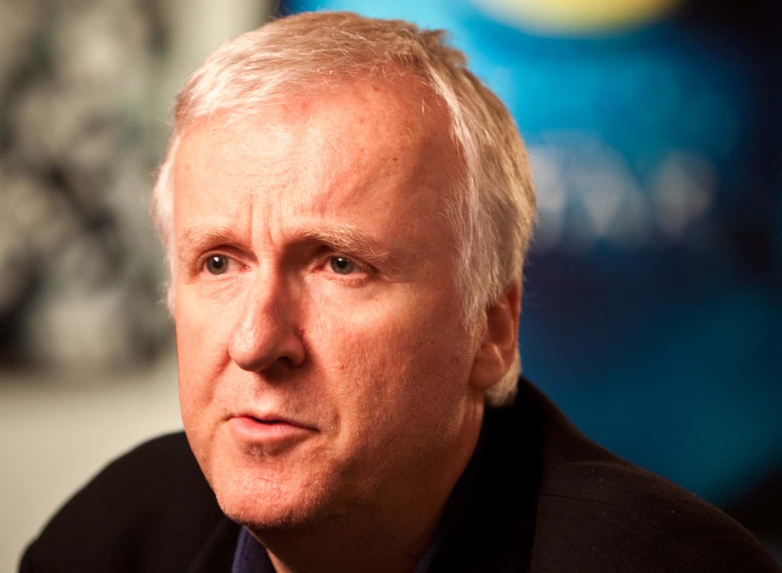 James Cameron in black jacket 