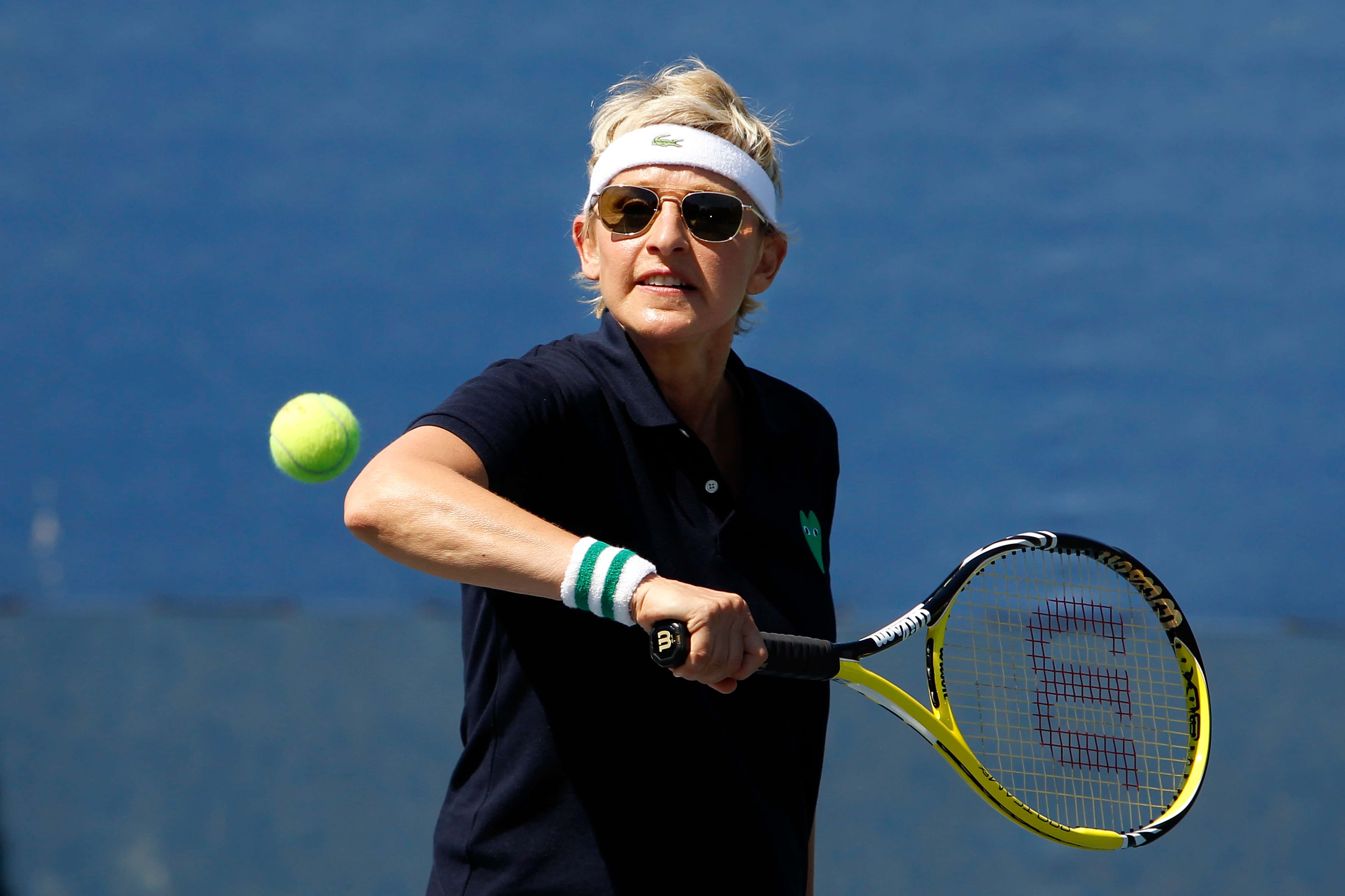 Ellen Degeneres returns a shot to Melanie Oudin during day eight of the 2010 U.S. Open