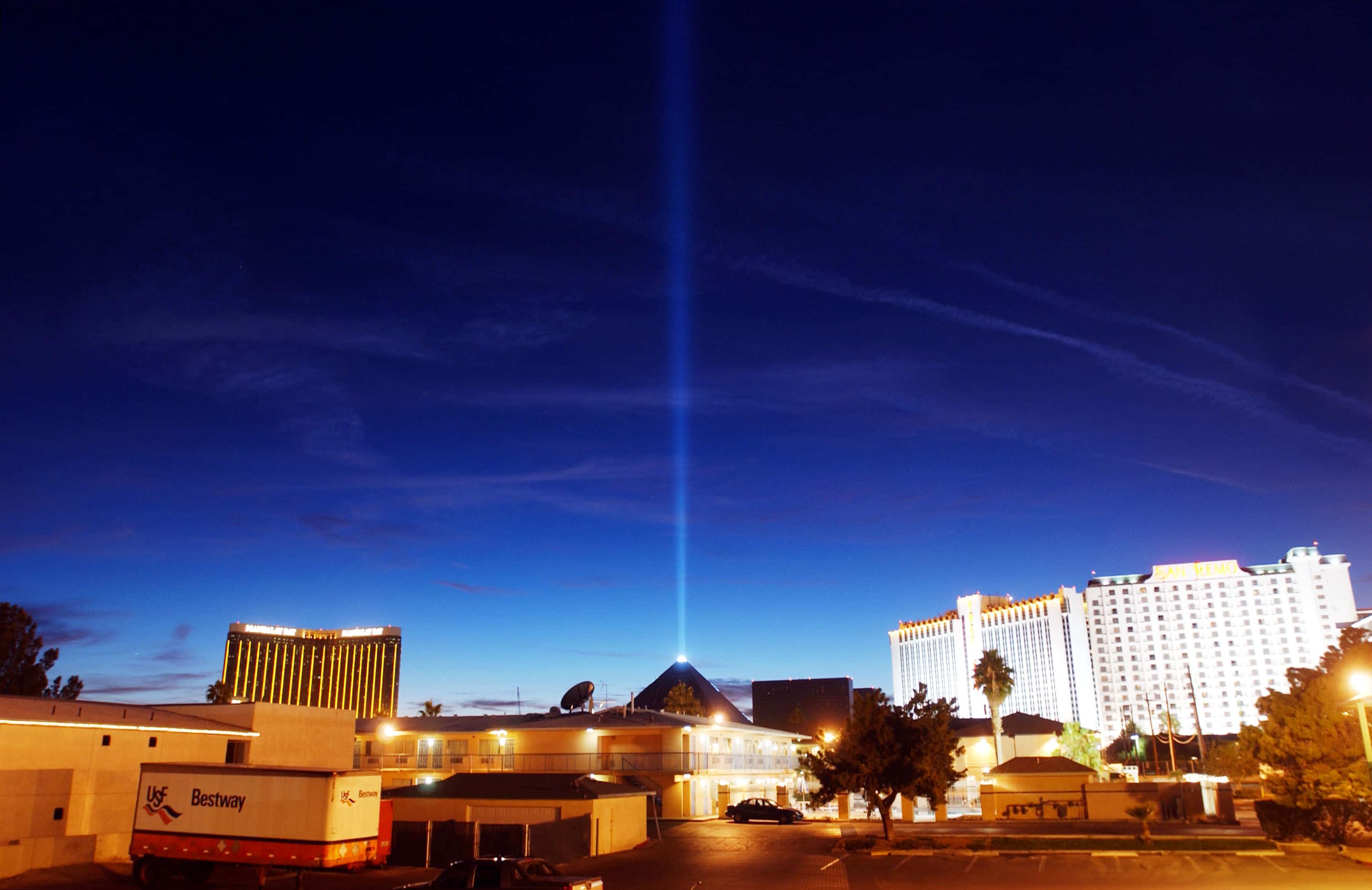 The Egyptian pyramid-shaped Luxor Hotel's light beam dominates the sky above the many hotels on or near the Las Vegas Strip