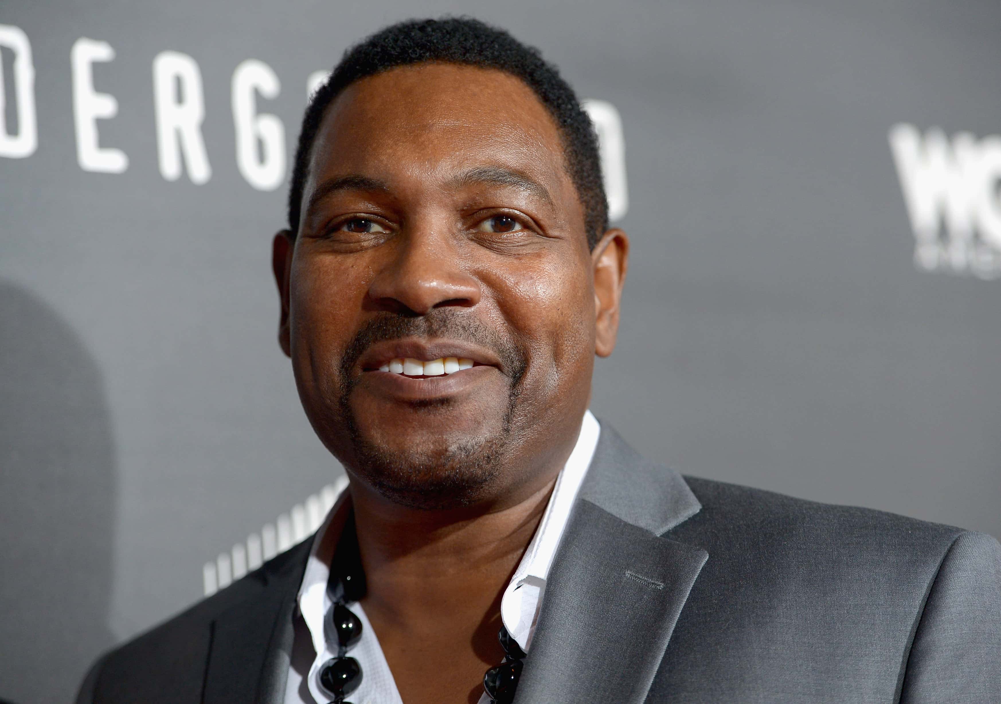 Mykelti Williamson at event in gray suit