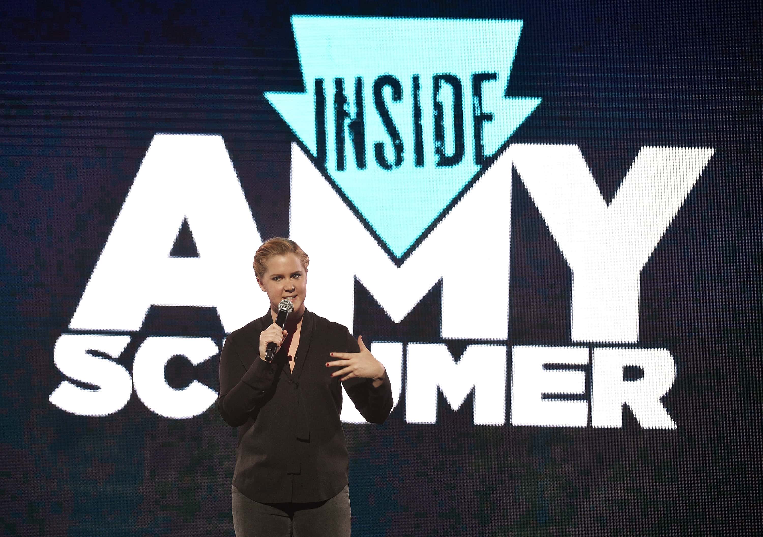Comedian Amy Schumer speaks onstage