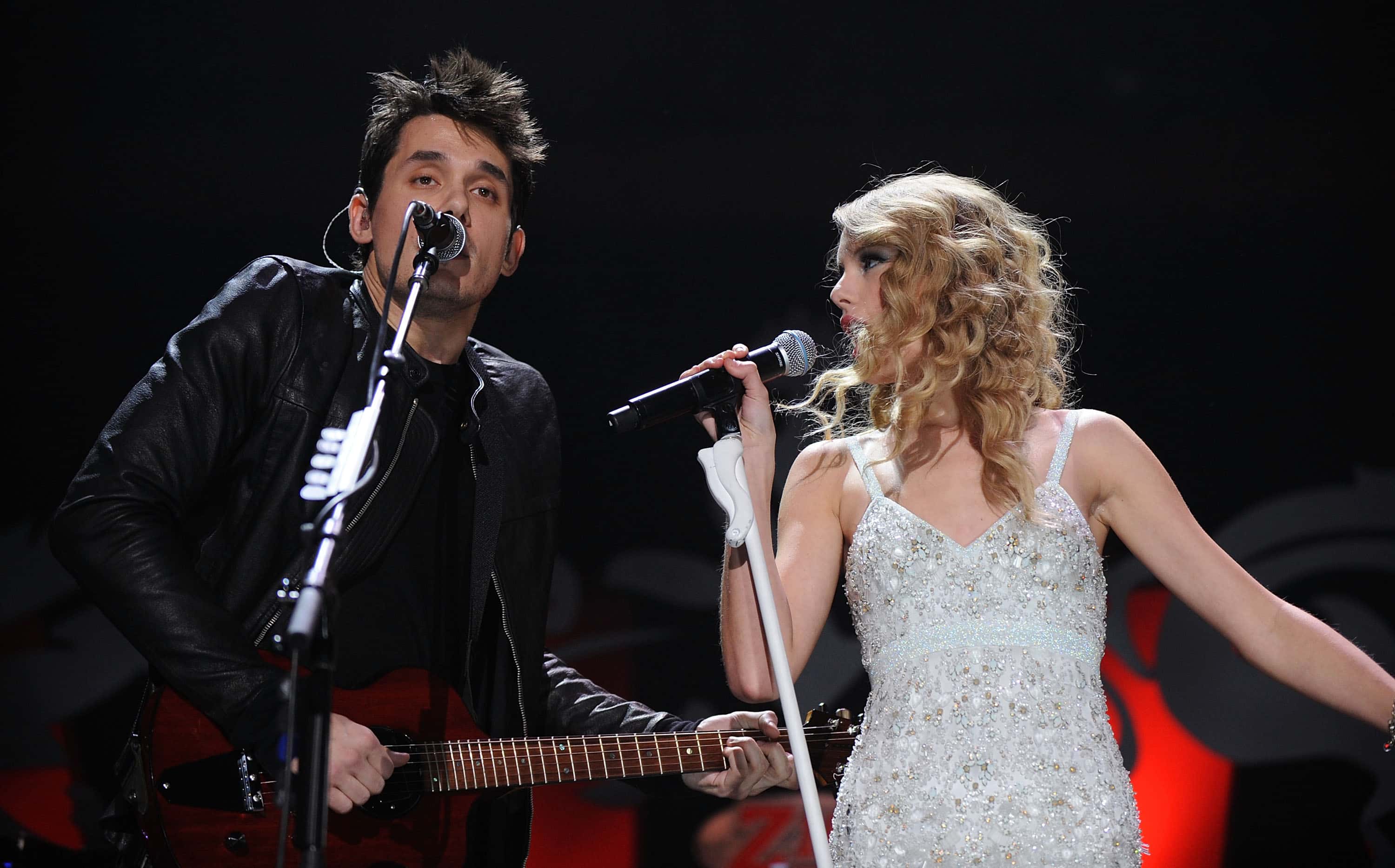 John Mayer and Taylor Swift perform onstage during Z100's Jingle Ball at Madison Square Garden
