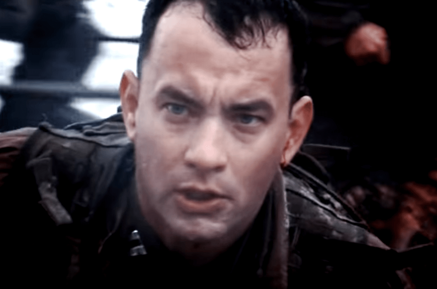 Screenshot of (Tom Hanks) Captain Miller looking at front - from Saving Private Ryan (1998)
