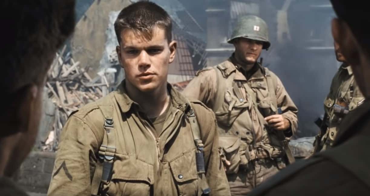Screenshot of (Matt Damon) Private Ryan talking with other soldiers - from Saving Private Ryan (1998)