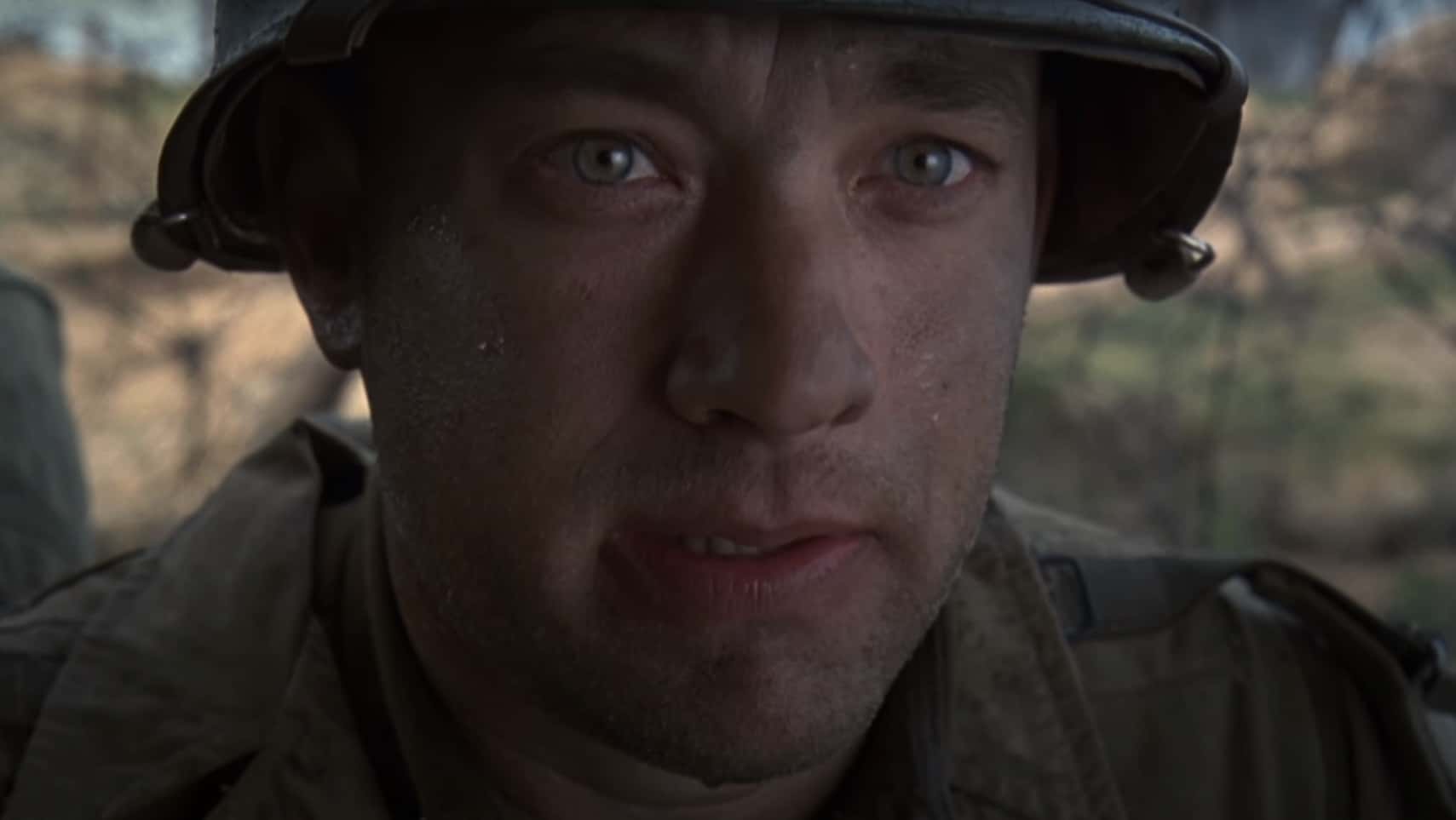 Screenshot of (Tom Hanks) Captain Miller looking at front - from Saving Private Ryan (1998)