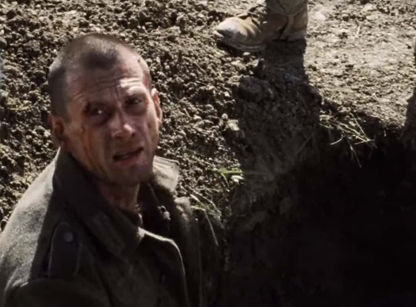 Screenshot of German soldier outside - from Saving Private Ryan (1998)