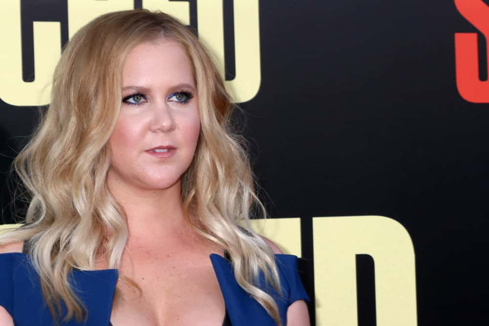 Amy Schumer in blue top