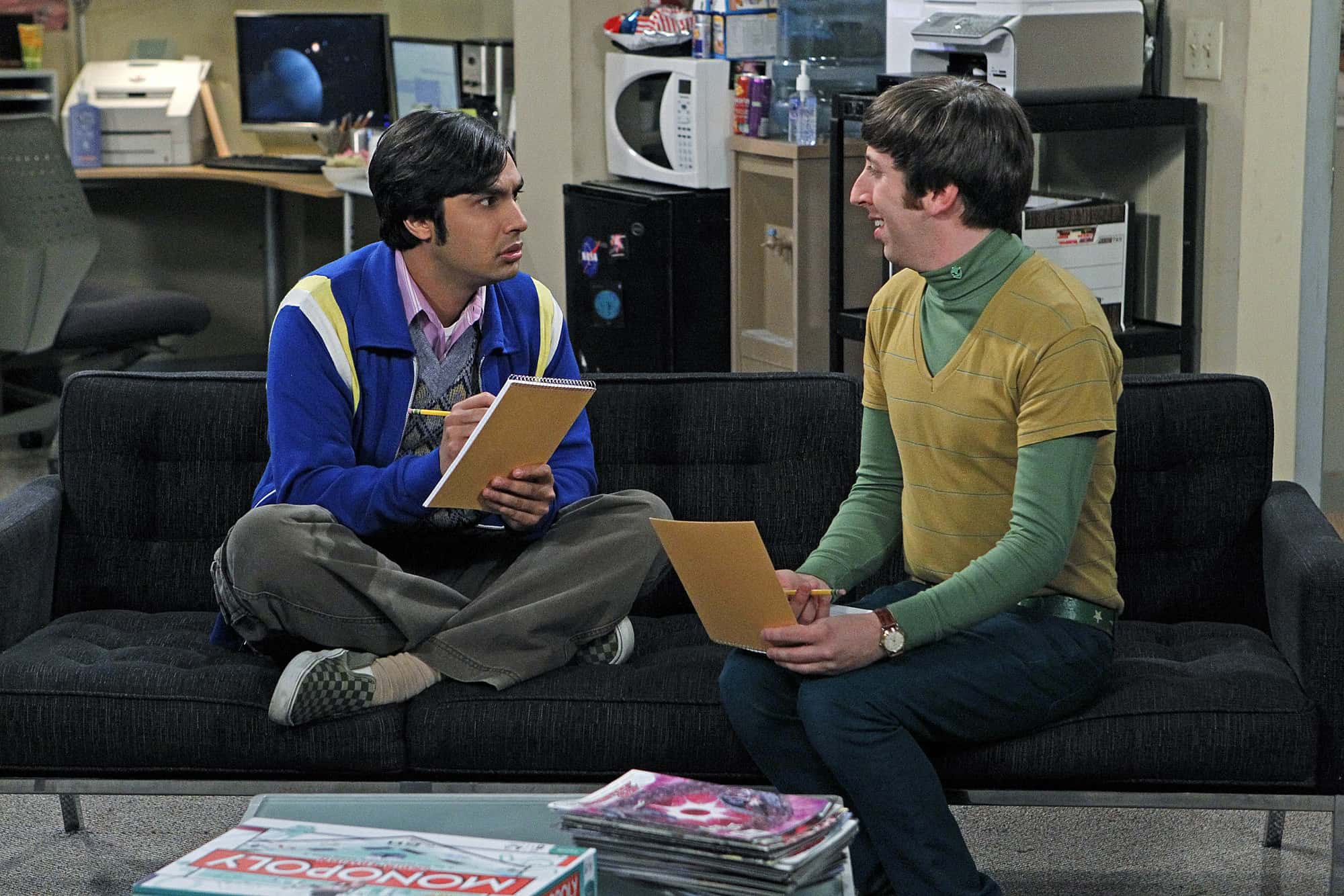 Howard (Simon Helberg, right), Raj (Kunal Nayyar, left) sitting on a couch