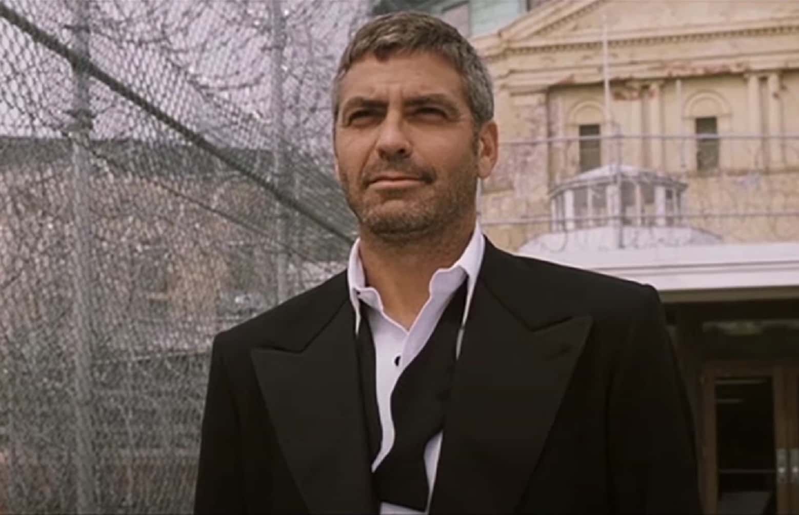 Screenshot of George Clooney standing outside in suit - from Ocean's Eleven (2001)