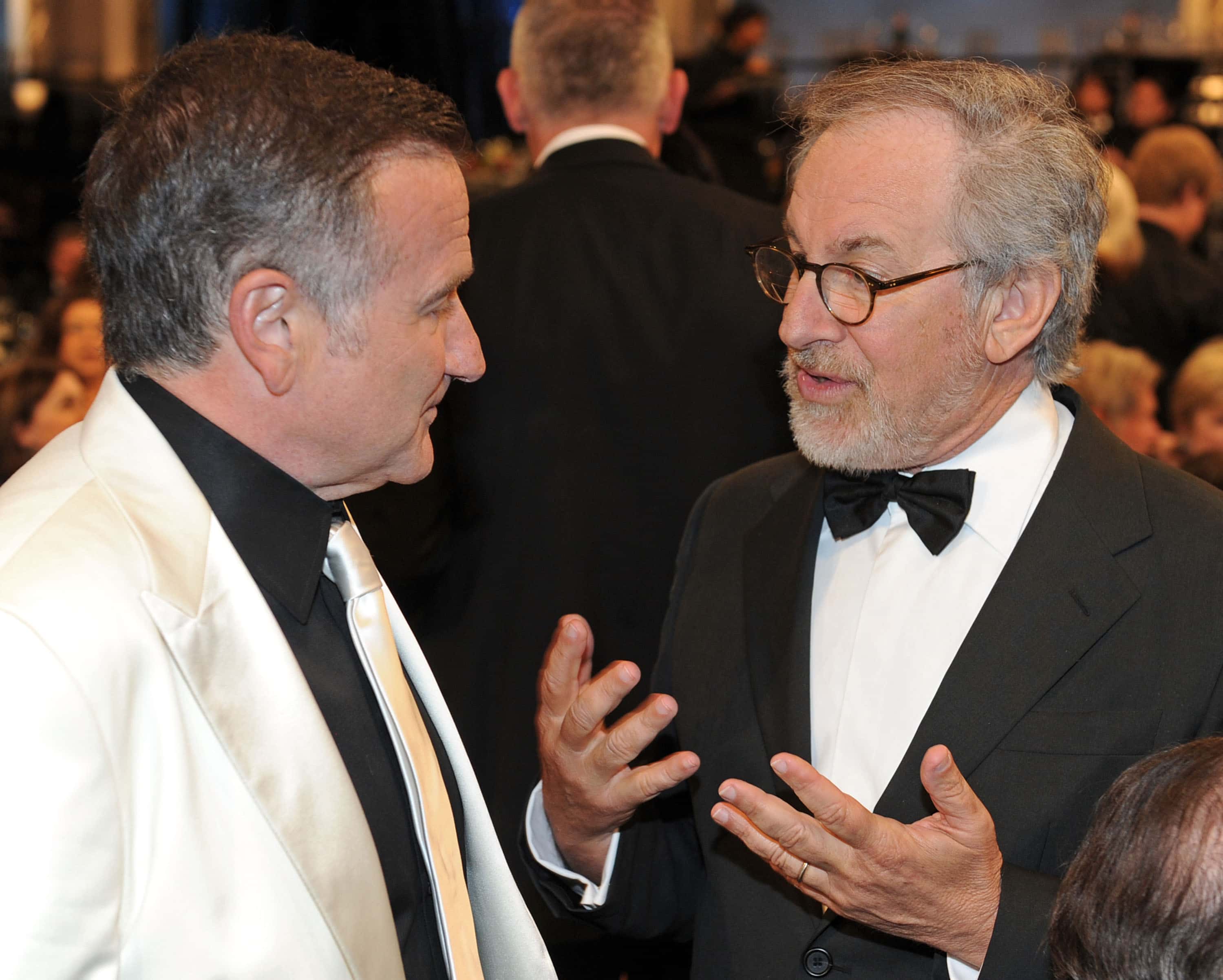 Robin Williams, Steven Spielberg at event speaking to each other