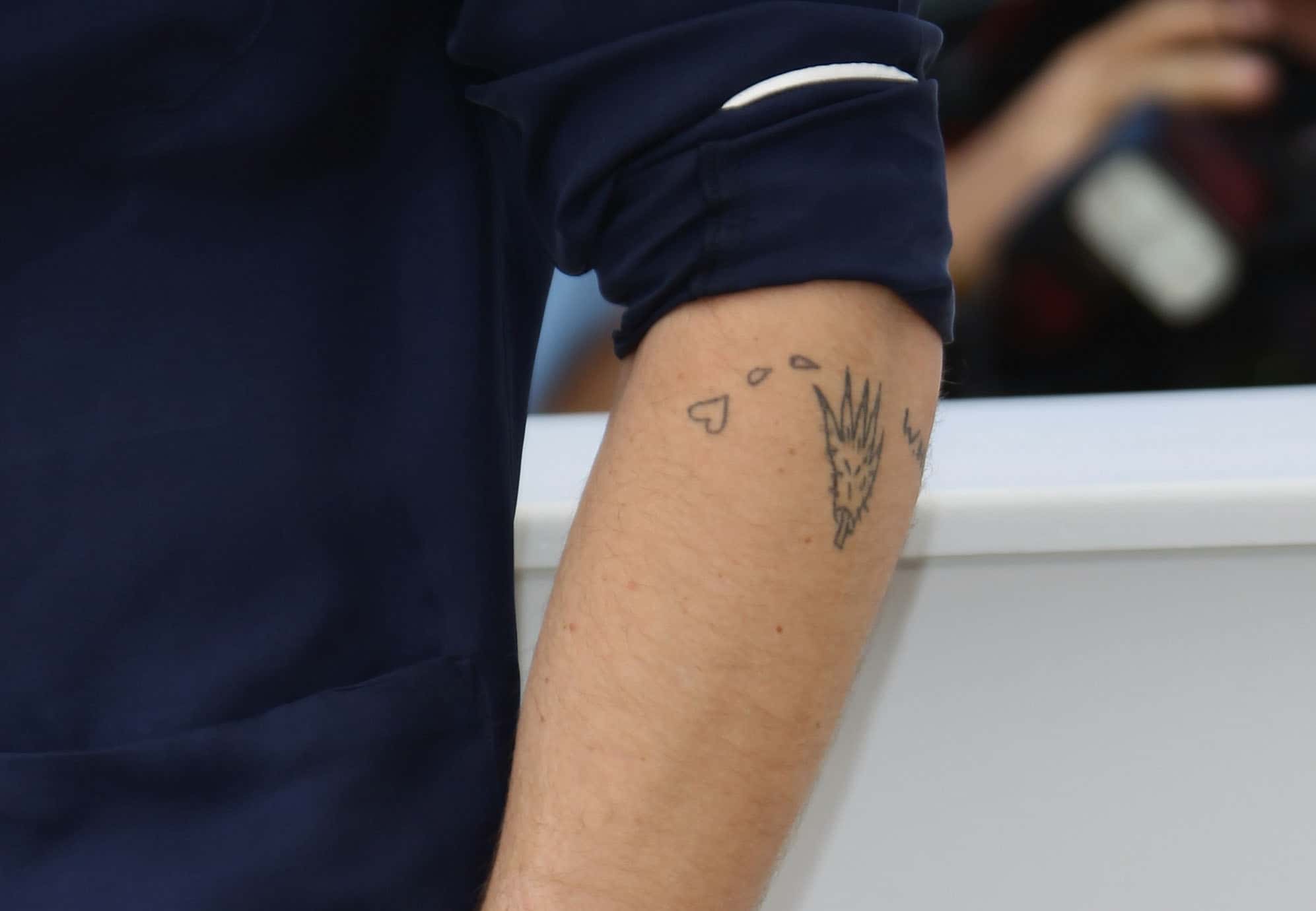 Actor Ryan Gosling (watch/tattoo detail) attends the 