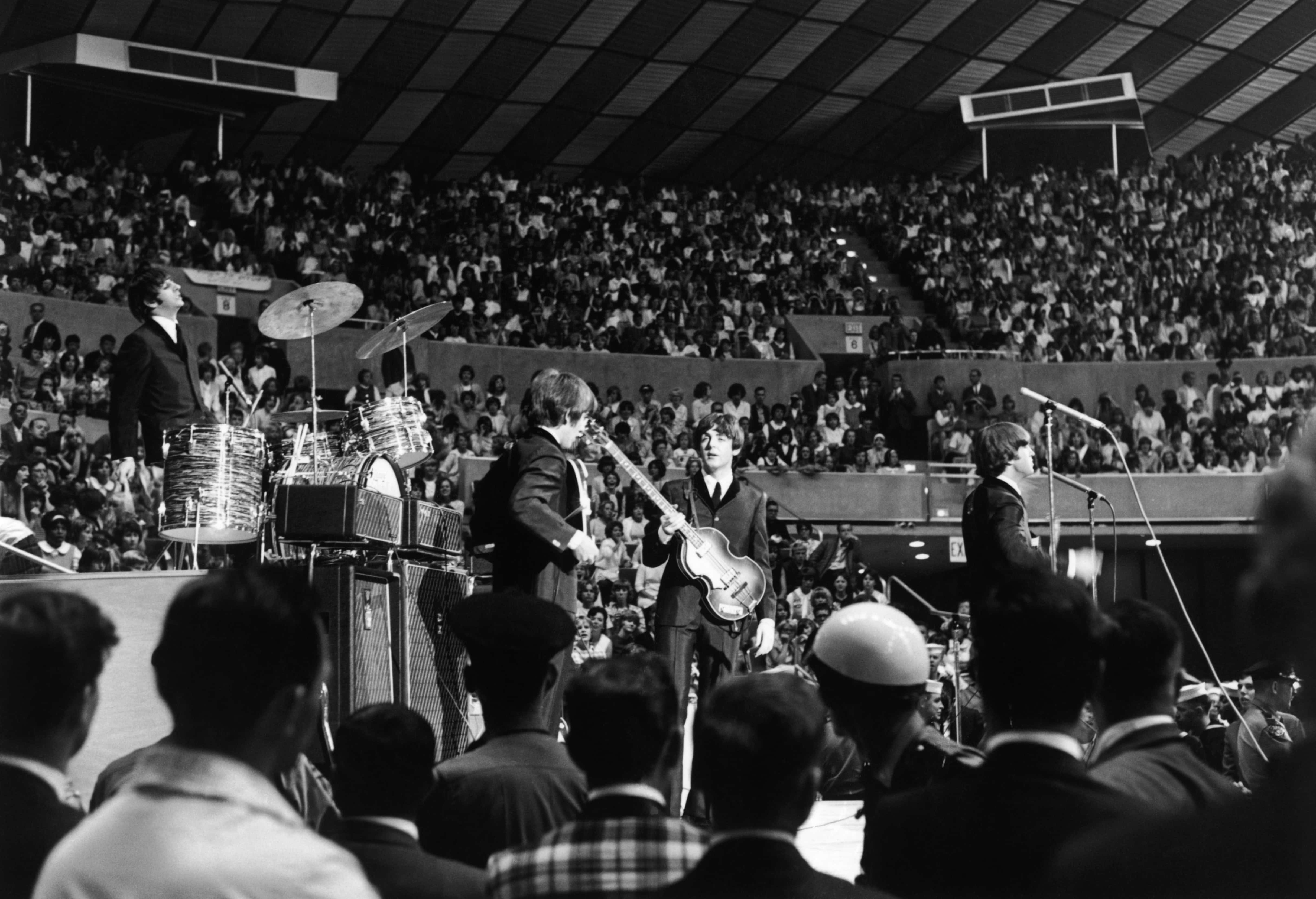 The Beatles perform at the Seattle Center Coliseum in Seattle, Washington