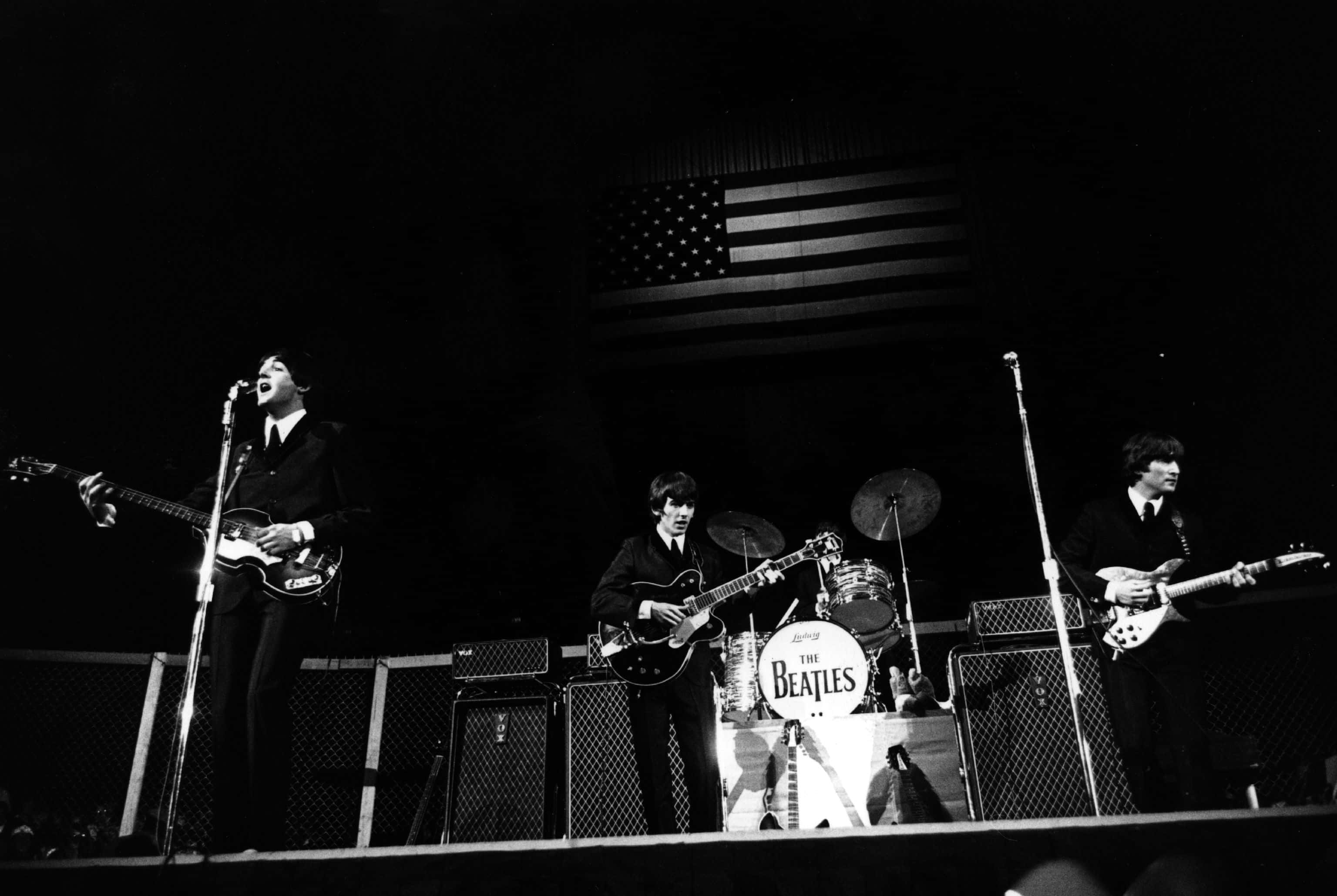 The Beatles perform at the Cow Palace in Daly City, California, during their Summer 1964 United States and Canada Tour