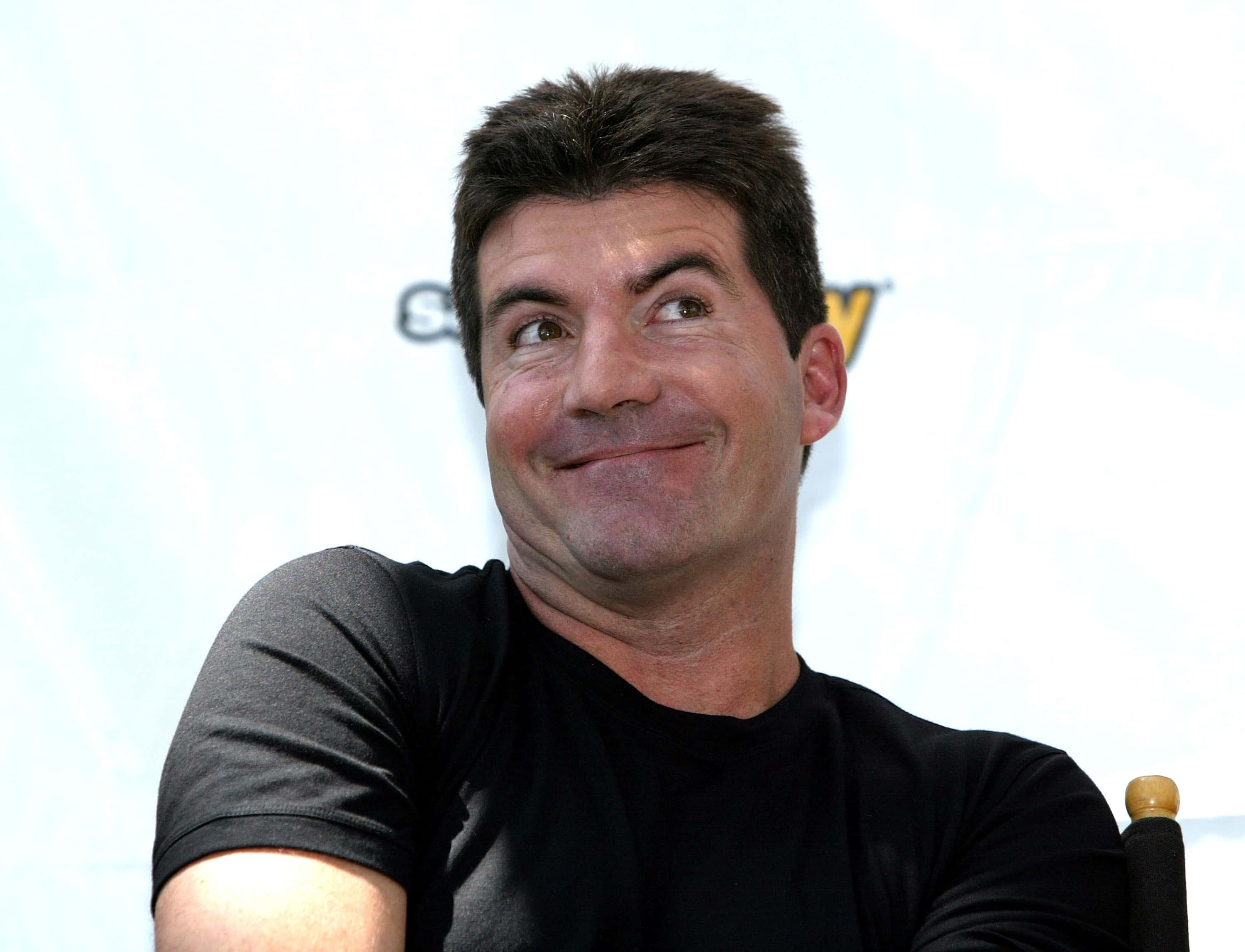 Simon Cowell in black t-shirt
