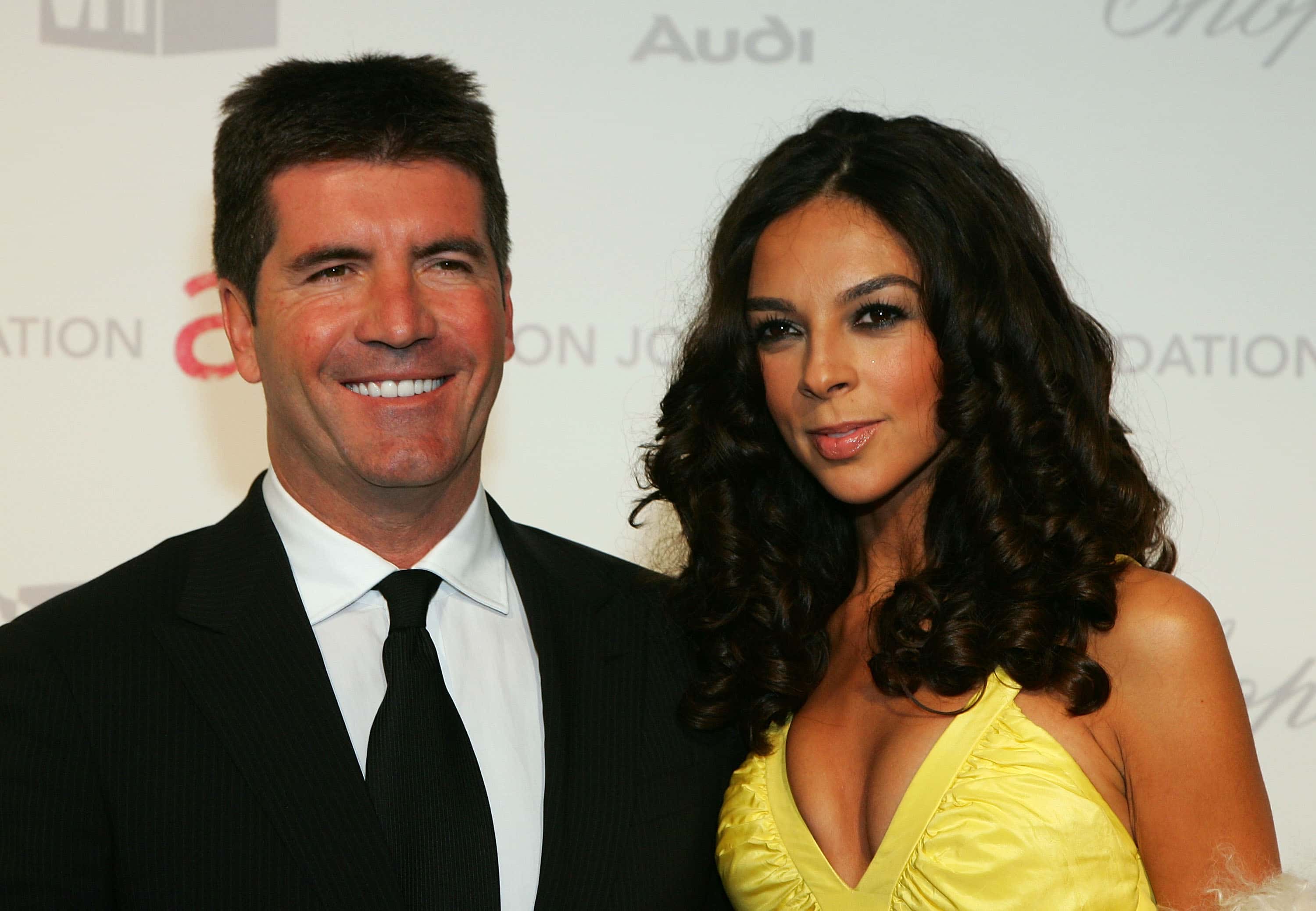 Television personality Simon Cowell and girlfriend/television personality Terri Seymour at an event 