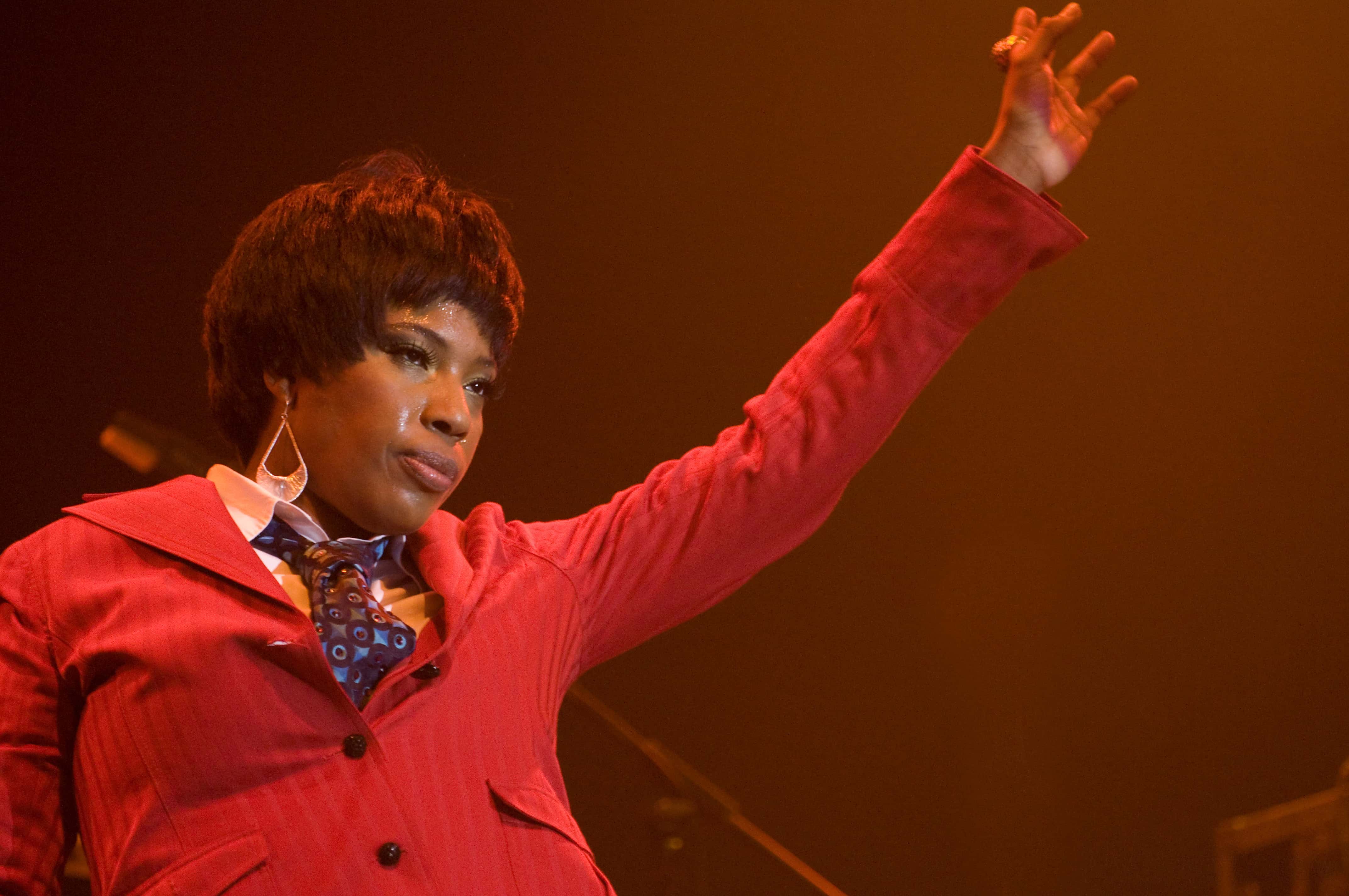Macy Gray in red jacket looking at front - 2008
