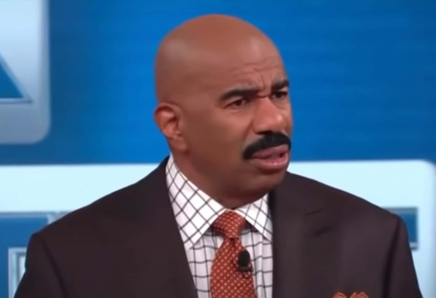 Screenshot of Steve Harvey looking at side upset - from Steve Harvey (2012/2017)