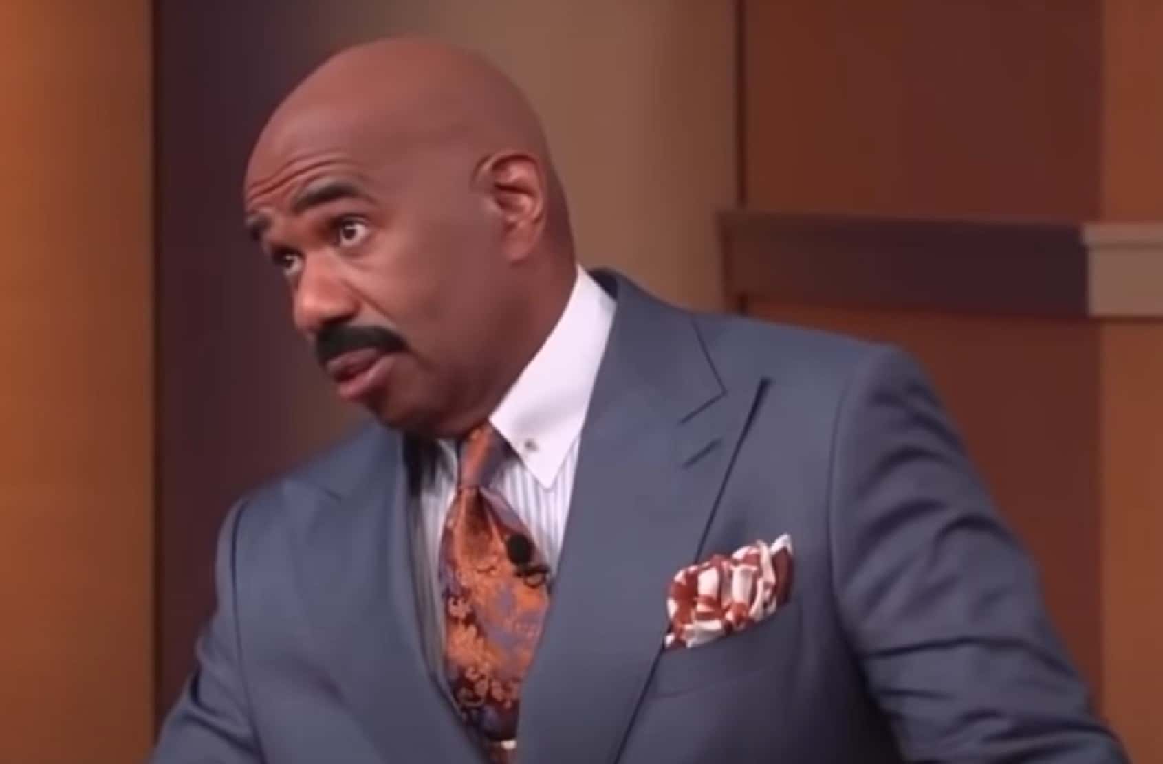 Screenshot of Steve Harvey looking at side upset - from Steve Harvey (2012/2017)