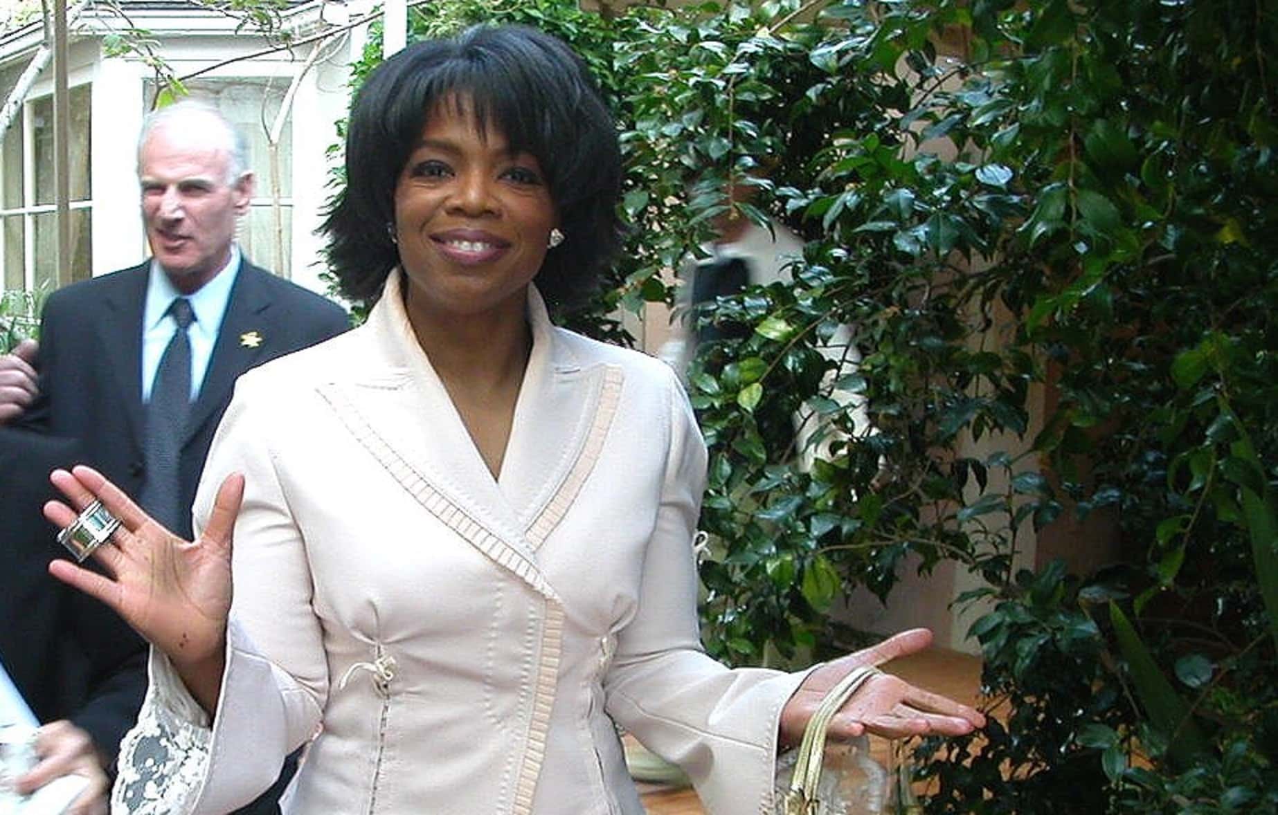Oprah Winfrey in a white outfit