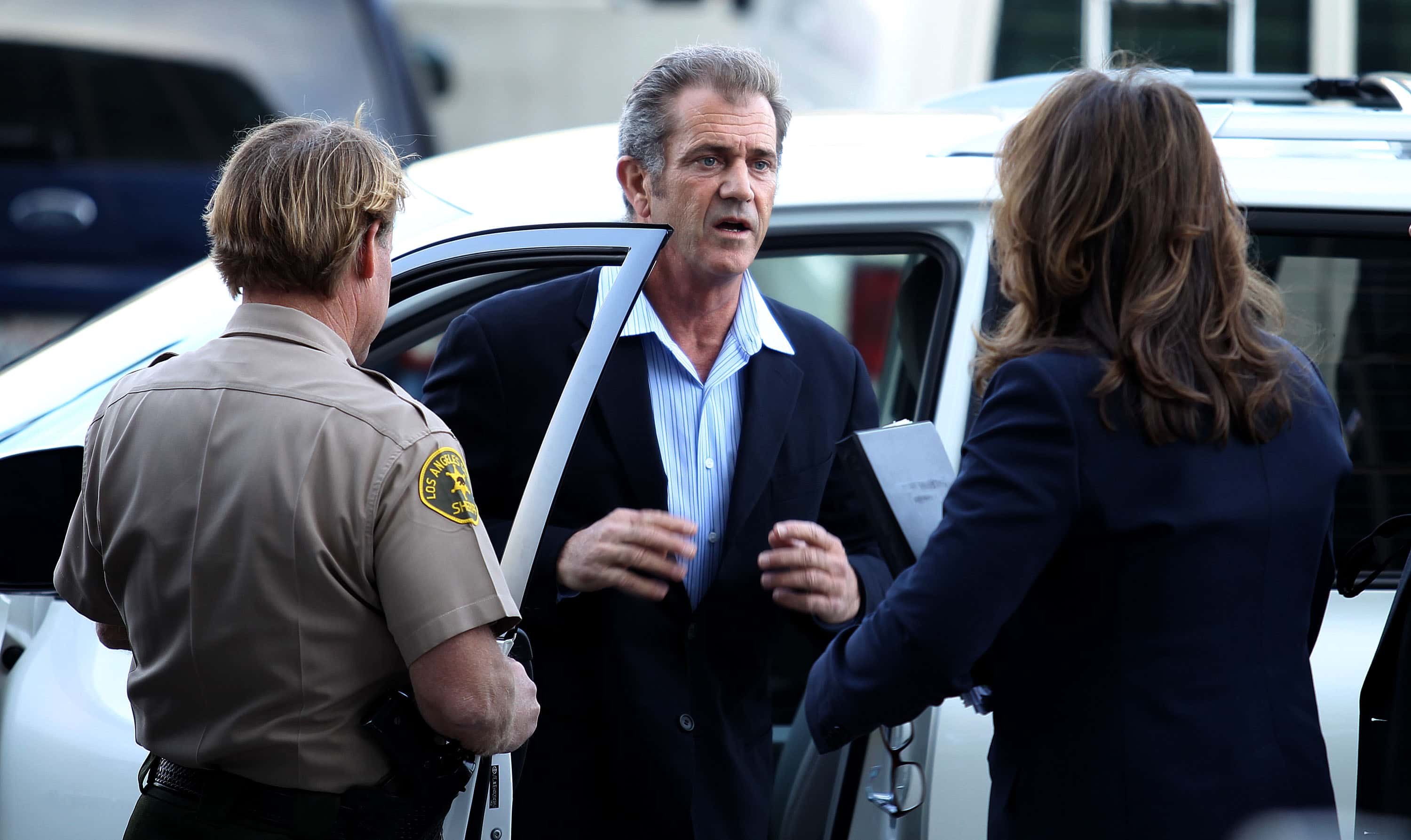 Actor Mel Gibson enter the Los Angeles Courthouse Airport branch on March 11, 2011 in Los Angeles, California