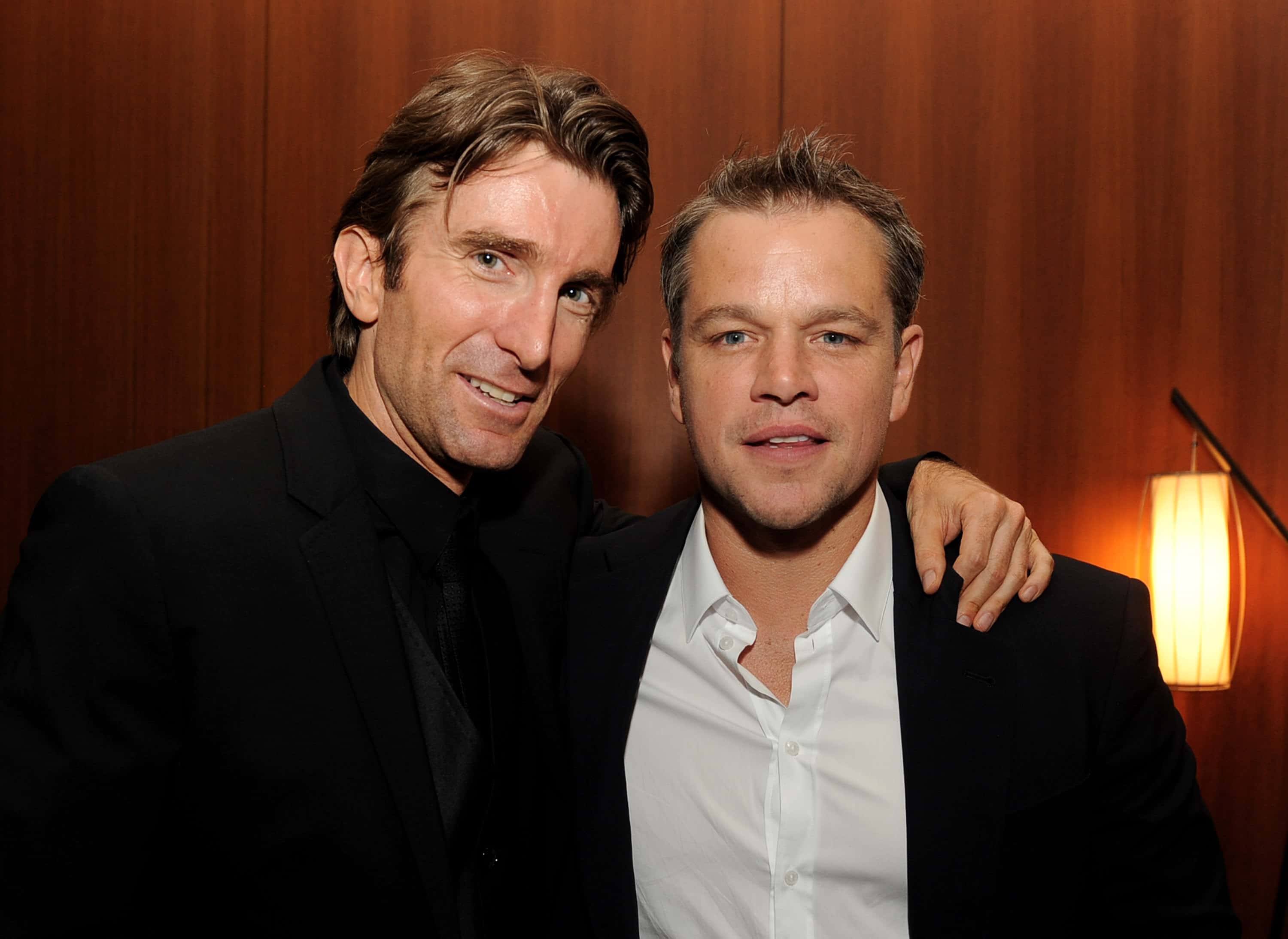 Actors Sharlto Copley (L) and Matt Damon