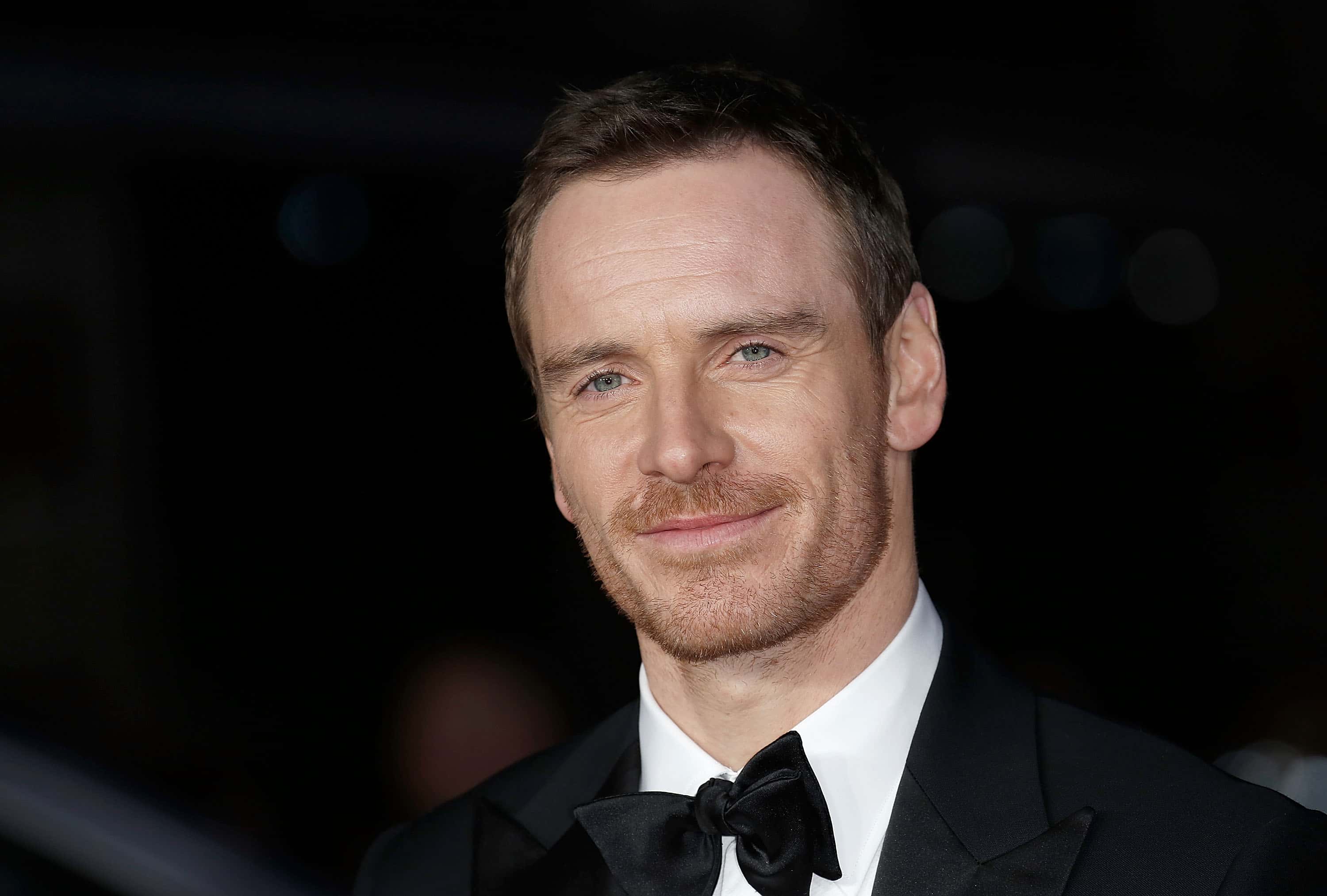 Michael Fassbender in suit at an event