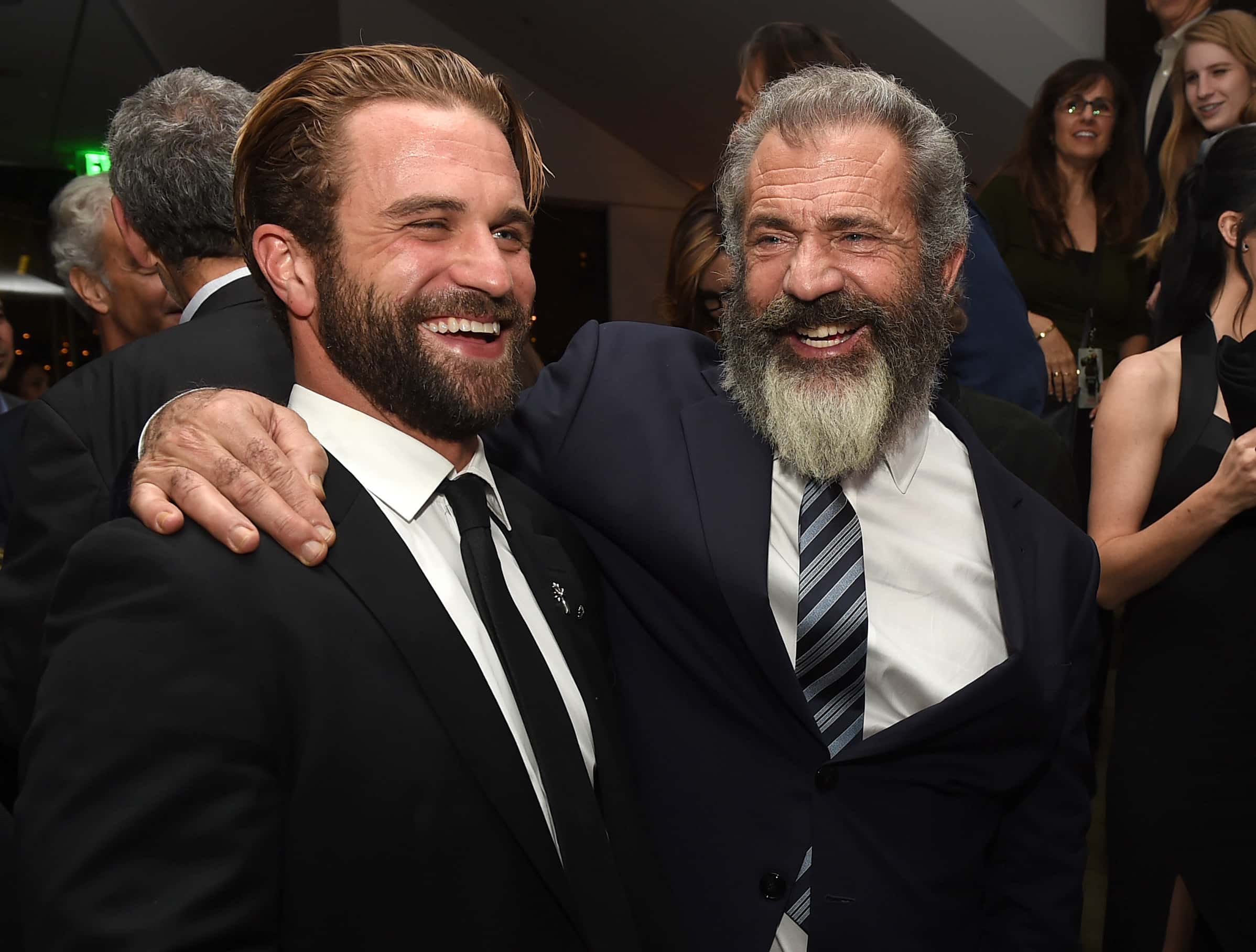 Director Mel Gibson (R) and his son actor Milo Gibson pose at the after party for a screening of Summit Entertainment's "Hacksaw Ridge"