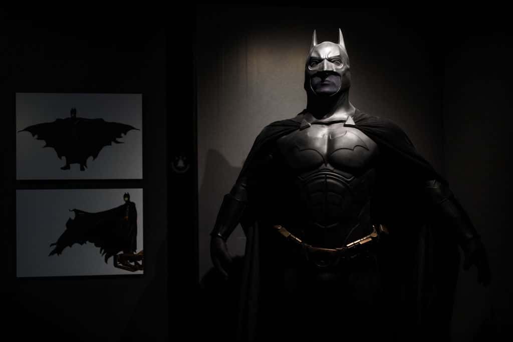 A Batman costume from the 2005 Batman Begins film worn by Christian Bale and designed by Lindy Hemming is on display at the DC Comics Exhibition: Dawn Of Super Heroes