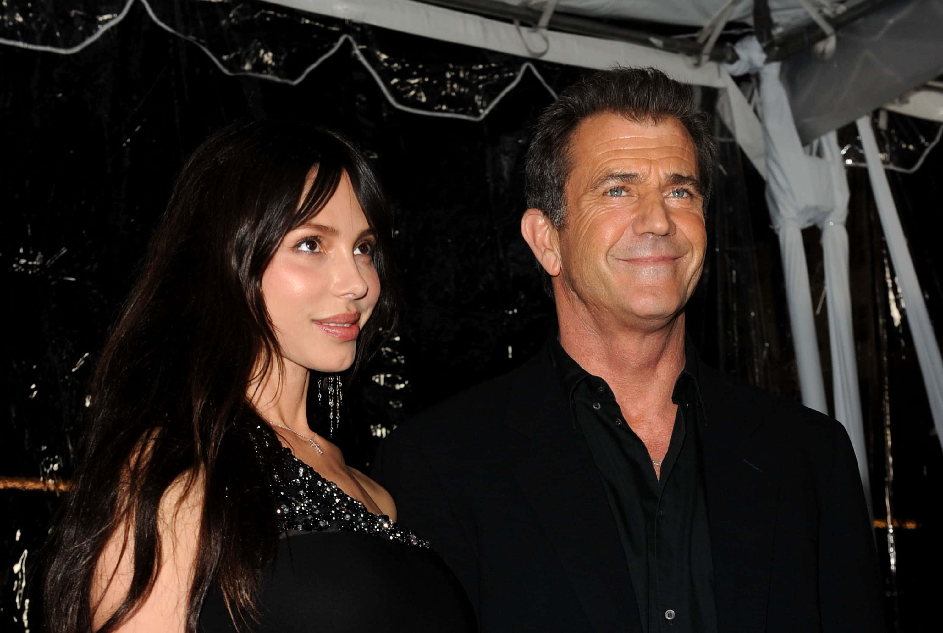Actor Mel Gibson (R) and Oksana Grigorieva arrive at the premiere Of Warner Bros. "The Edge Of Darkness"