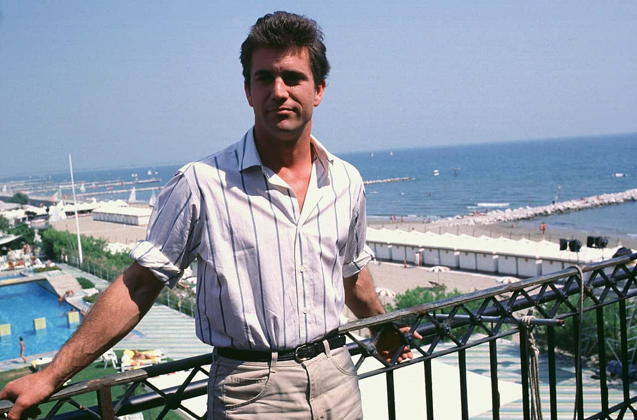 Portrait Photo of Mel Gibson in white shirt, smiling