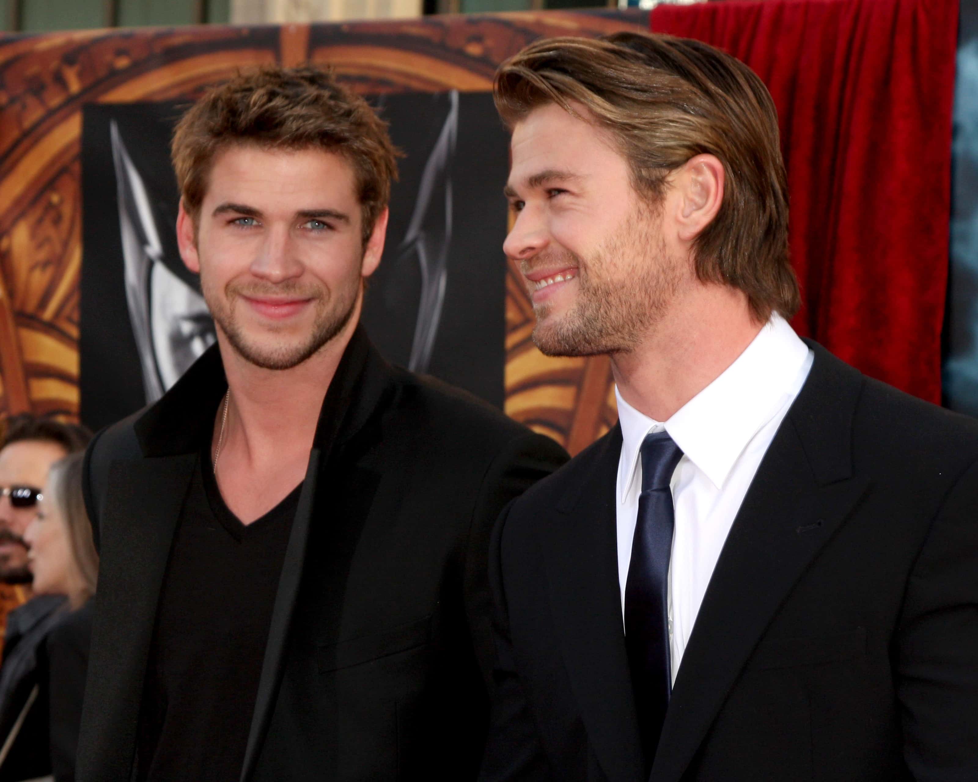 Liam Hemsworth, Chris Hemsworth arriving at the 