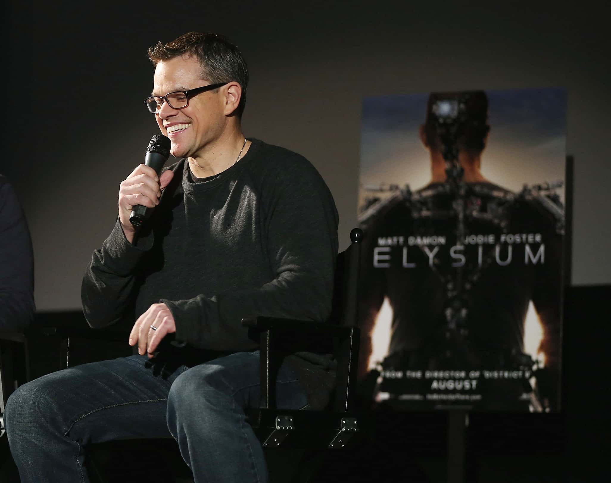 Matt Damon speaks on stage