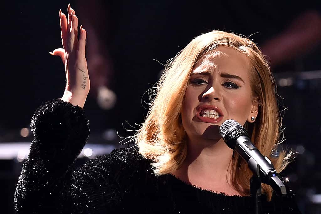 Adele performs live on stage during the television show 2015