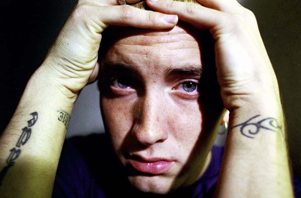 Eminem holding his head