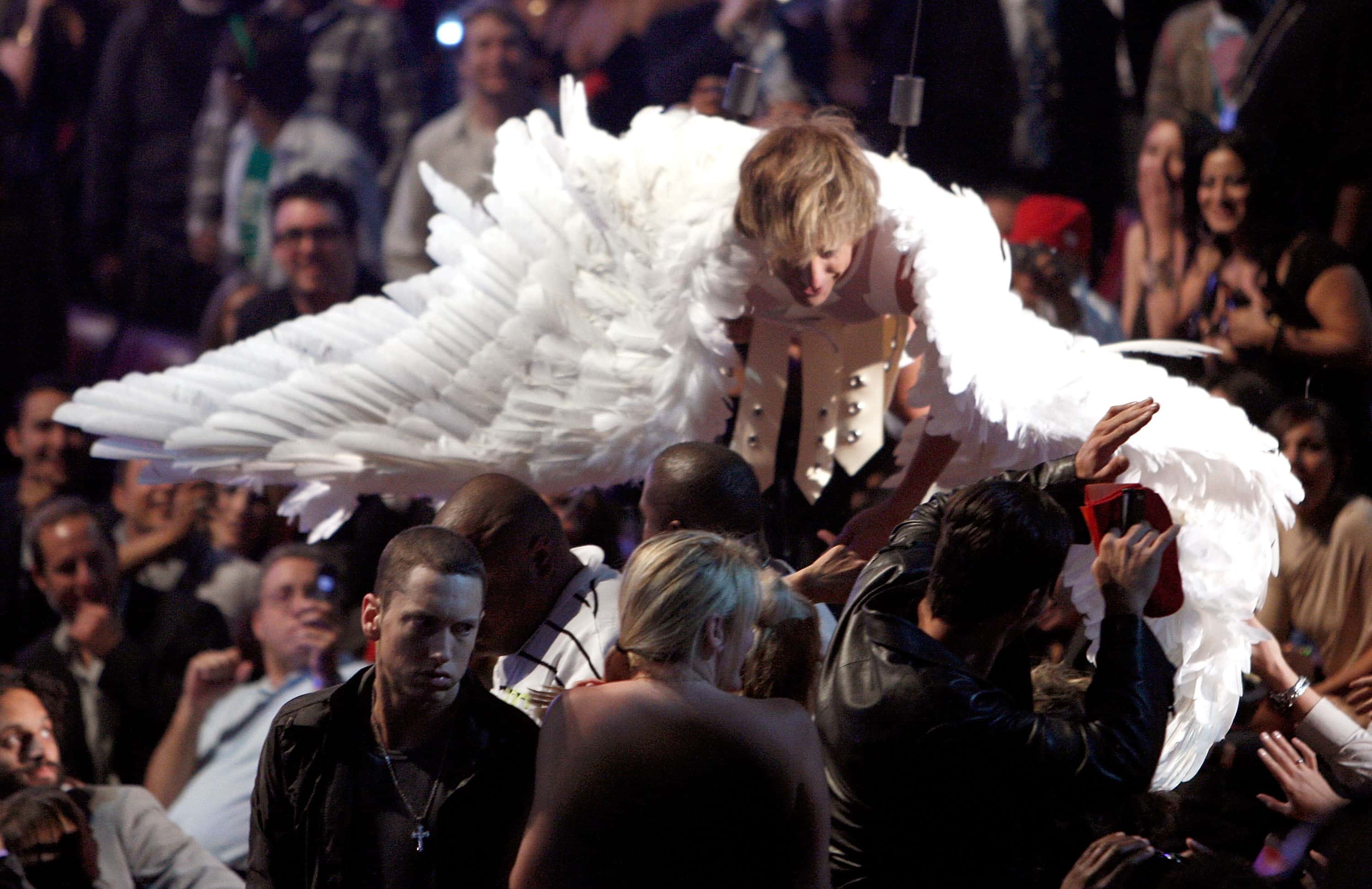 Eminem (L) and actor Sacha Baron Cohen
