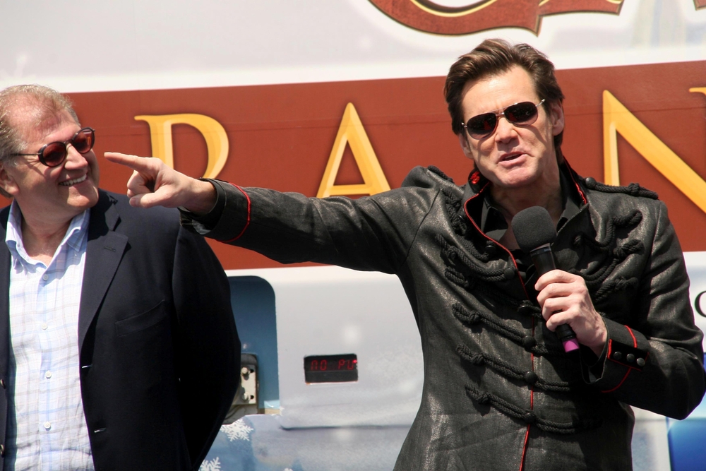 Jim Carrey holding a microphone