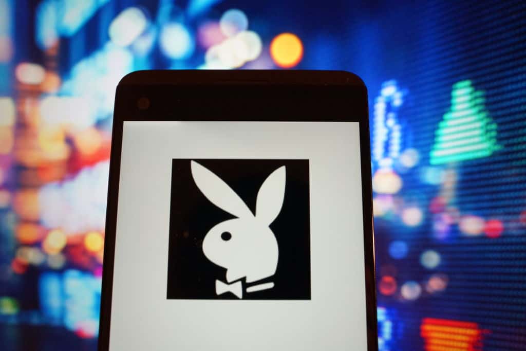 The logo of Playboy is seen in a smartphone.