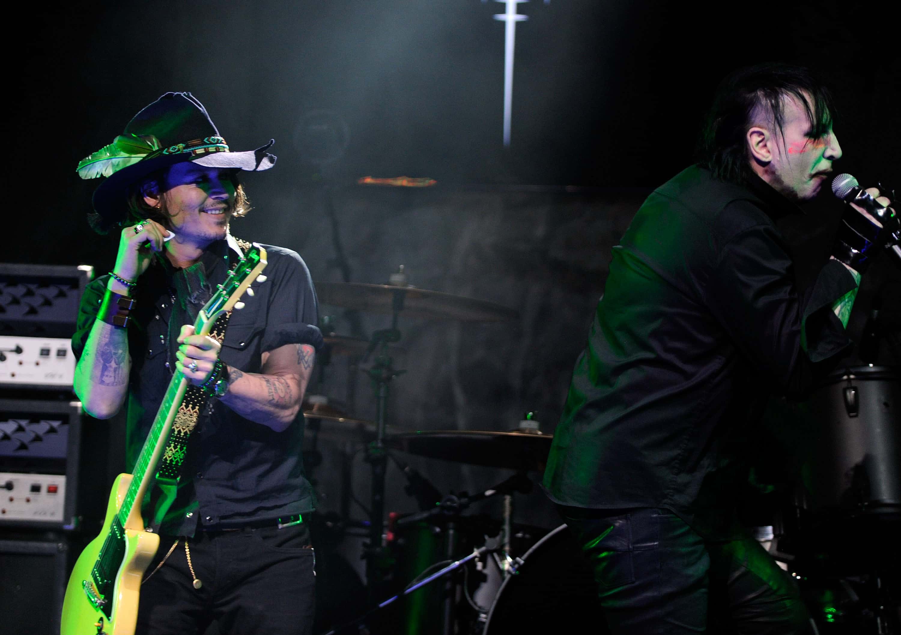 Actor Johnny Depp performs on stage with Marilyn Manson